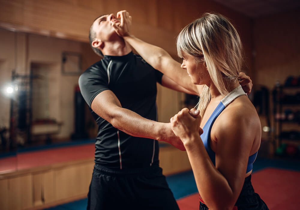 Martial arts instructor with kids
