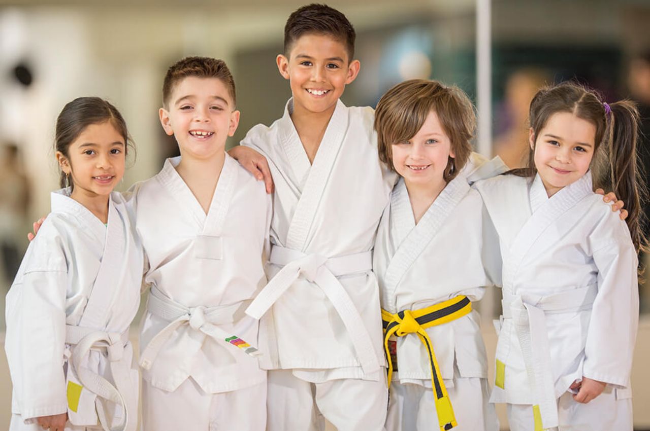 Martial arts instructor with kids