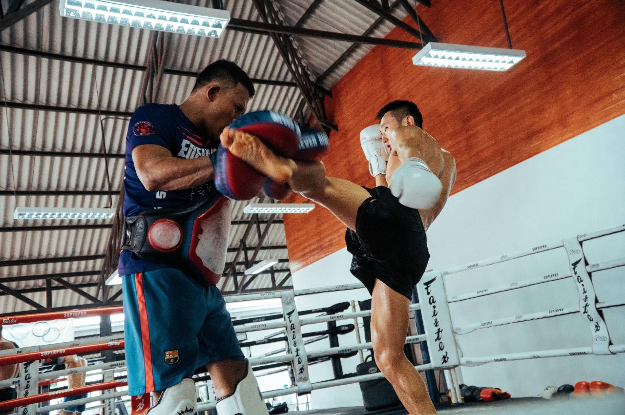 Martial arts instructor with kids