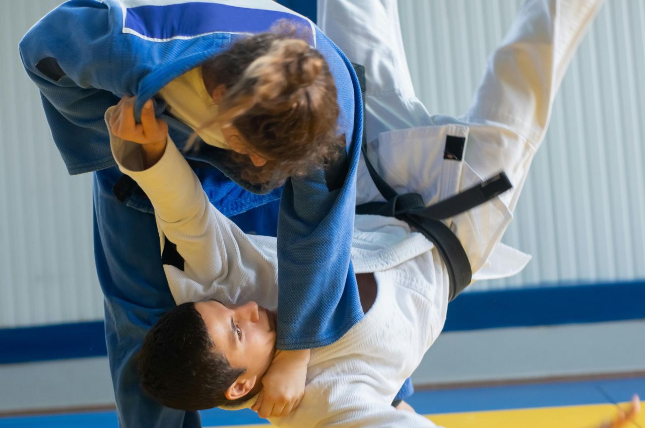Martial arts instructor with kids