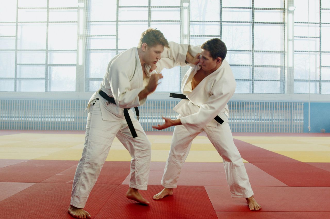 Martial arts instructor with kids