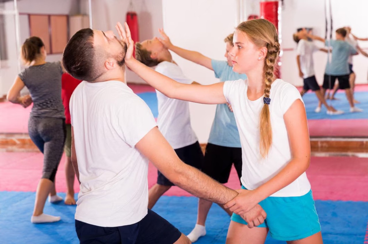Martial arts instructor with kids