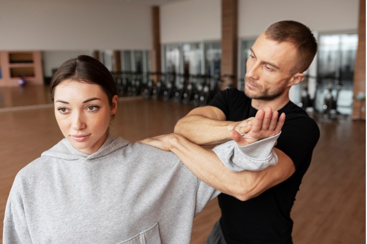 Martial arts instructor with kids
