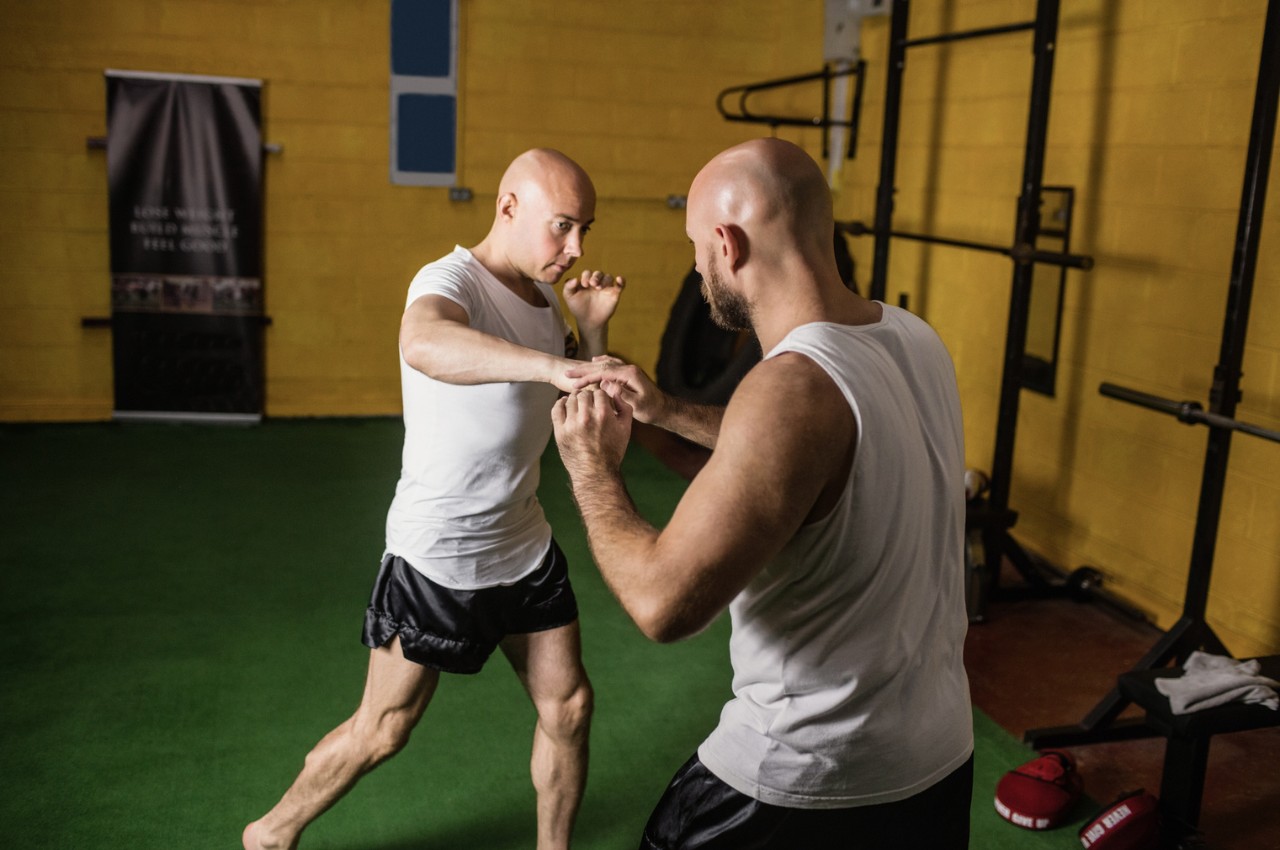 Martial arts instructor with kids