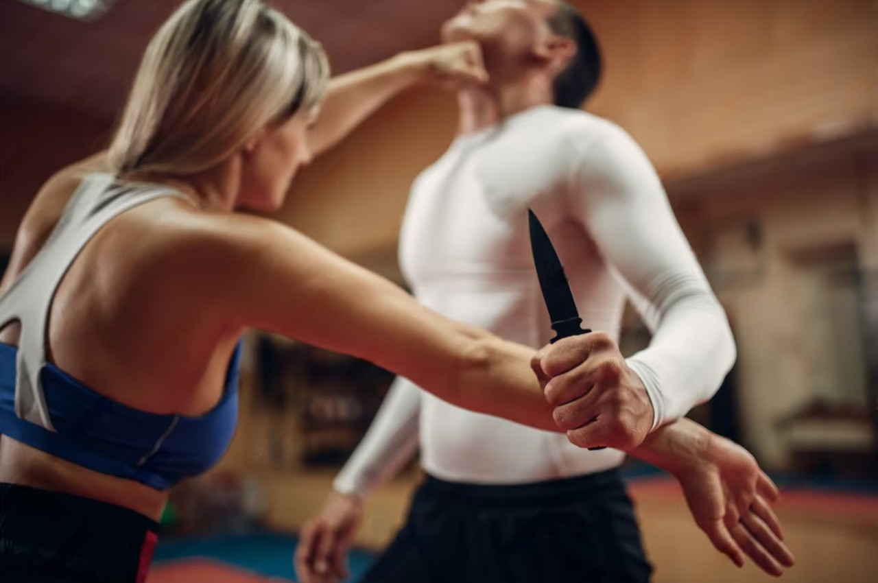 Martial arts instructor with kids