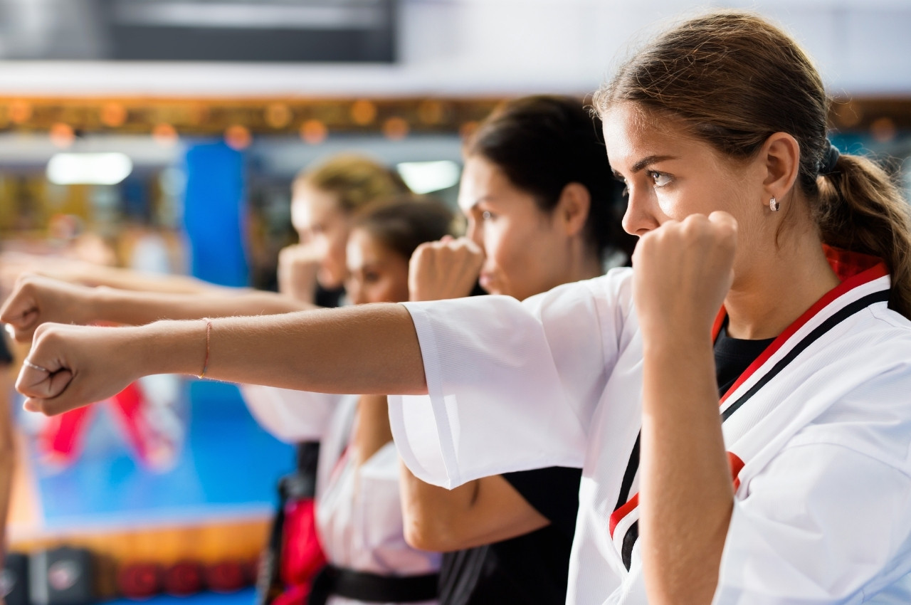 Martial arts instructor with kids