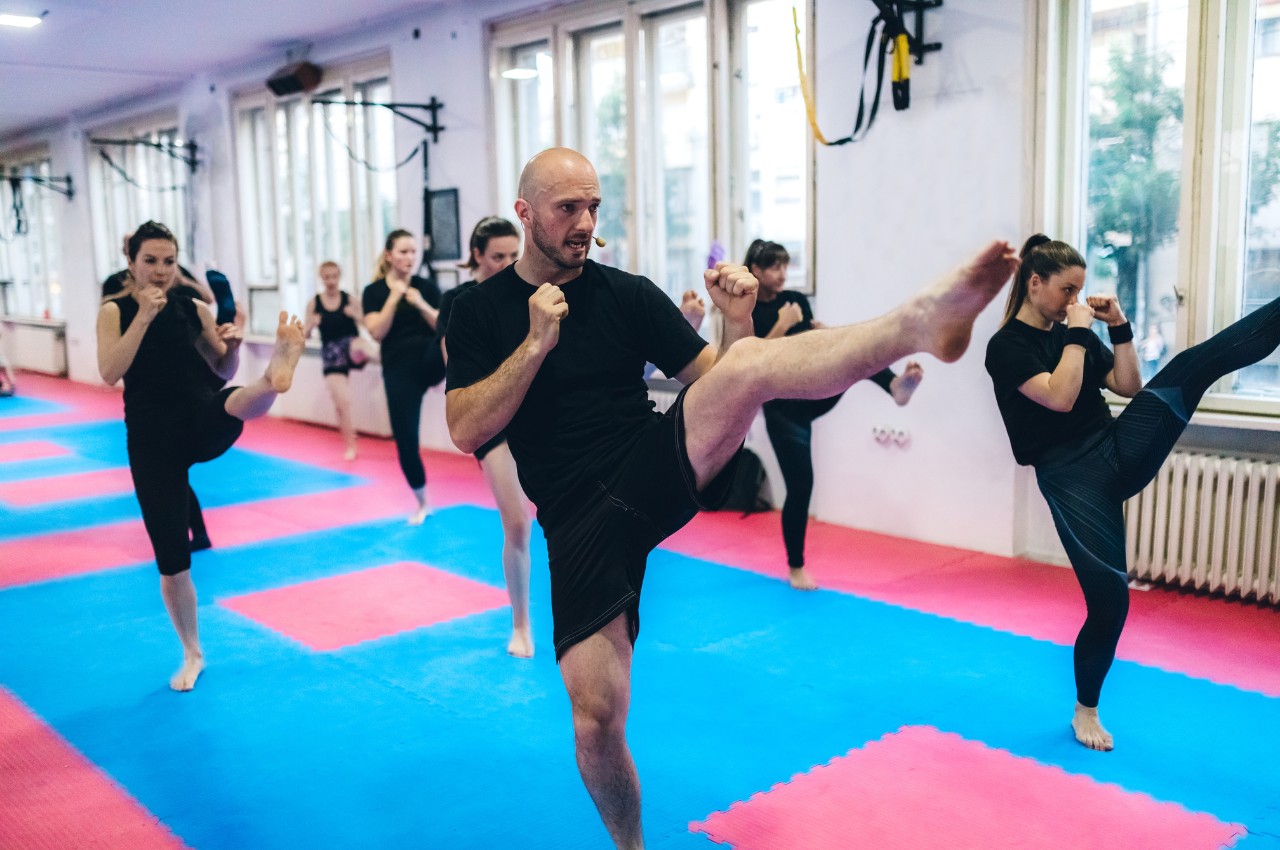 Martial arts instructor with kids