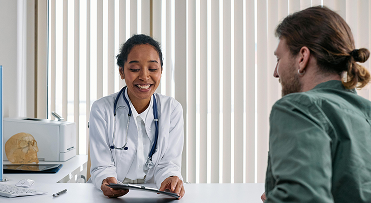 A person consulting with a healthcare provider, representing the importance of seeking professional help for sleep disorders. A person consulting with a healthcare provider, representing the importance of seeking professional help for sleep disorders.