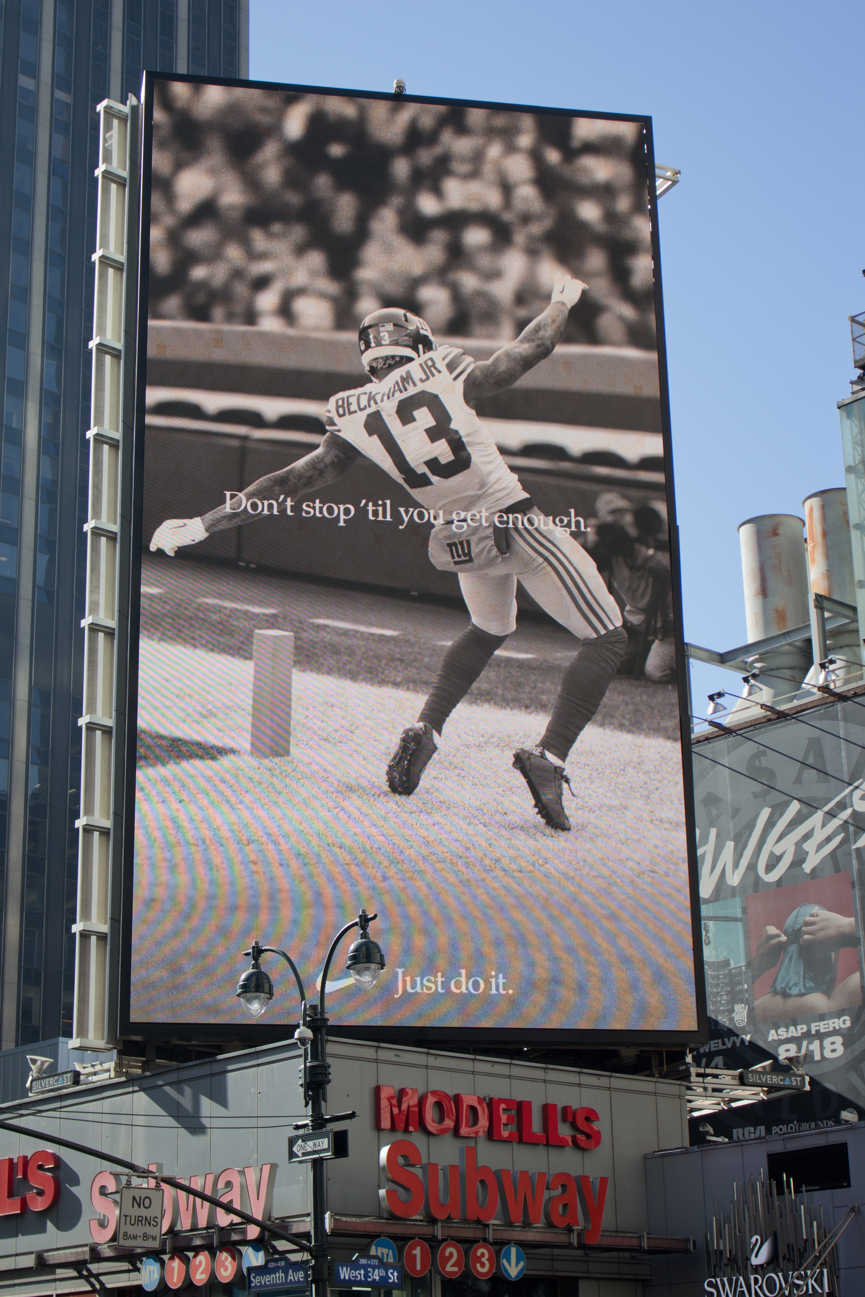 picture of a billboard in New York showing a football player