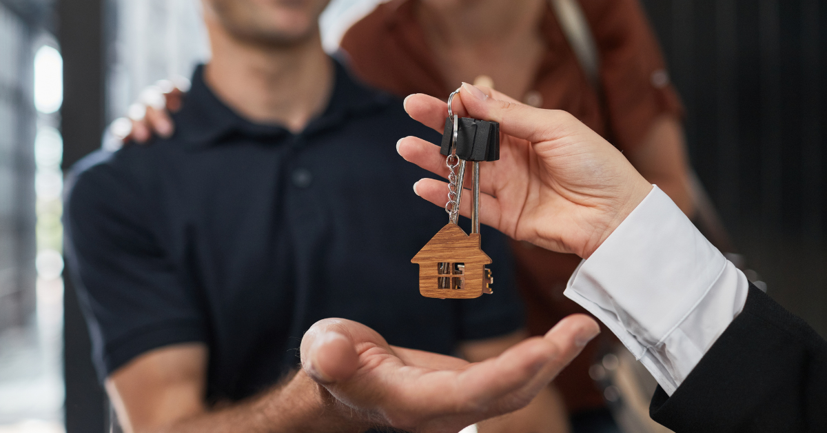 Homeowners and advisor reviewing whether to sell house as is or fix it.