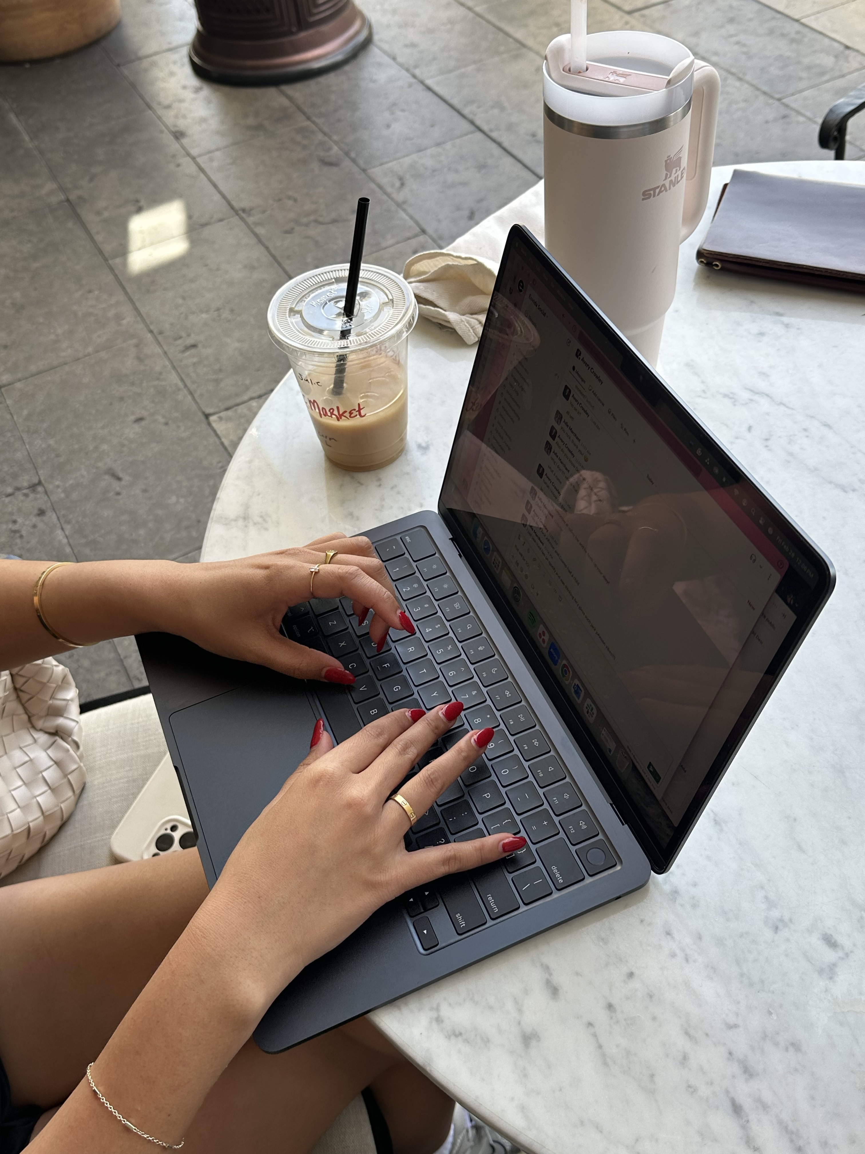 Woman embracing her alcohol-free lifestyle while working on laptop, representing digital connection in sobriety Woman embracing her alcohol-free lifestyle while working on laptop, representing digital connection in sobriety