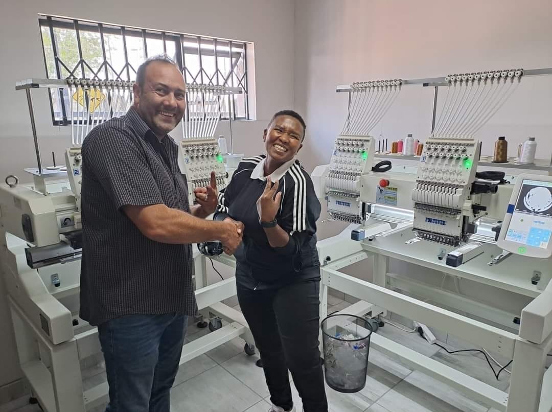 Client installation — operator with Fortever embroidery machine