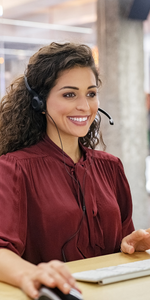 Woman managing customer relations and communication in automotive. Woman managing customer relations and communication in automotive.