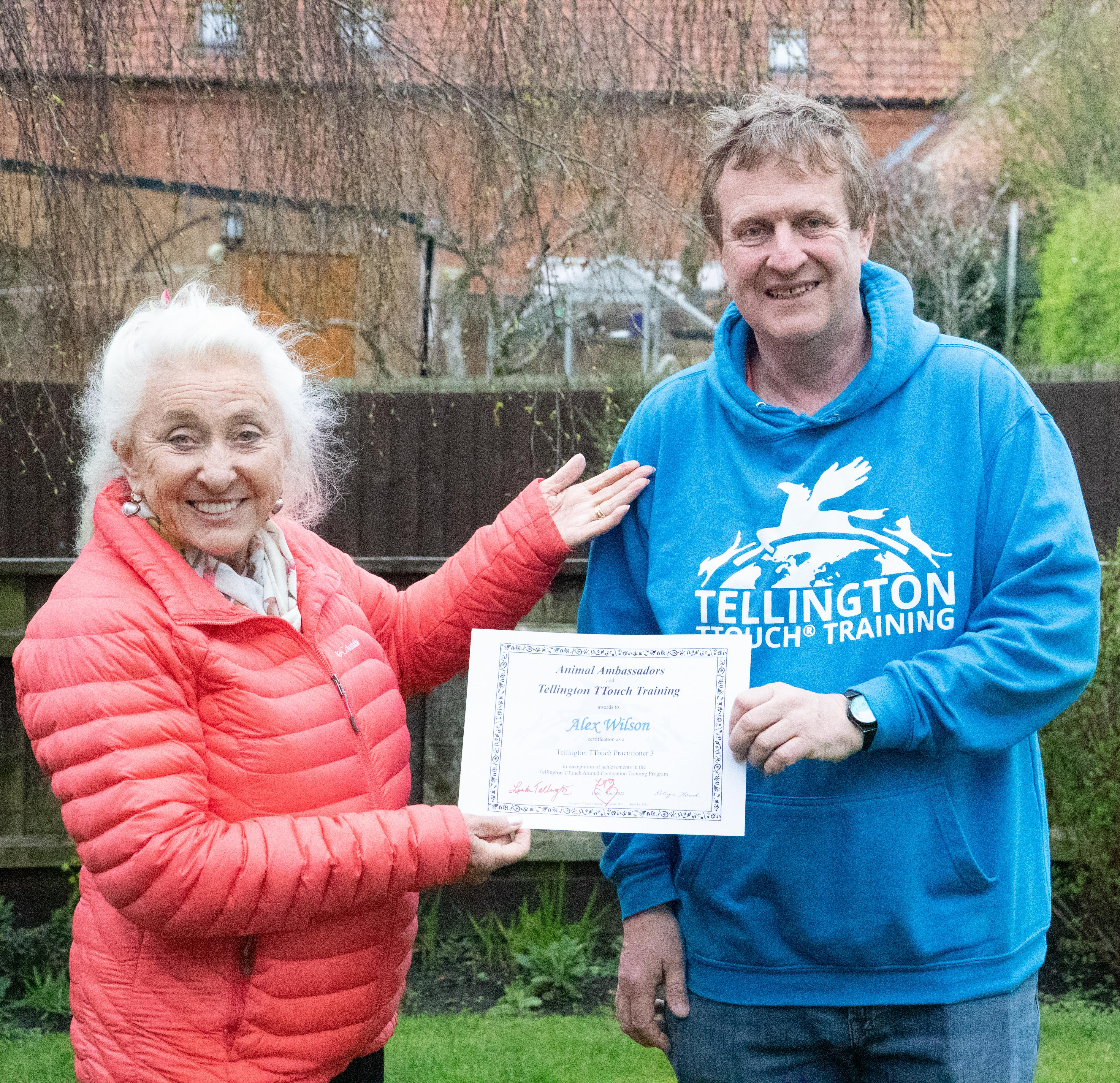 Alex Wilson receiving his senior practitioner status from founder Linda Tellington-Jones