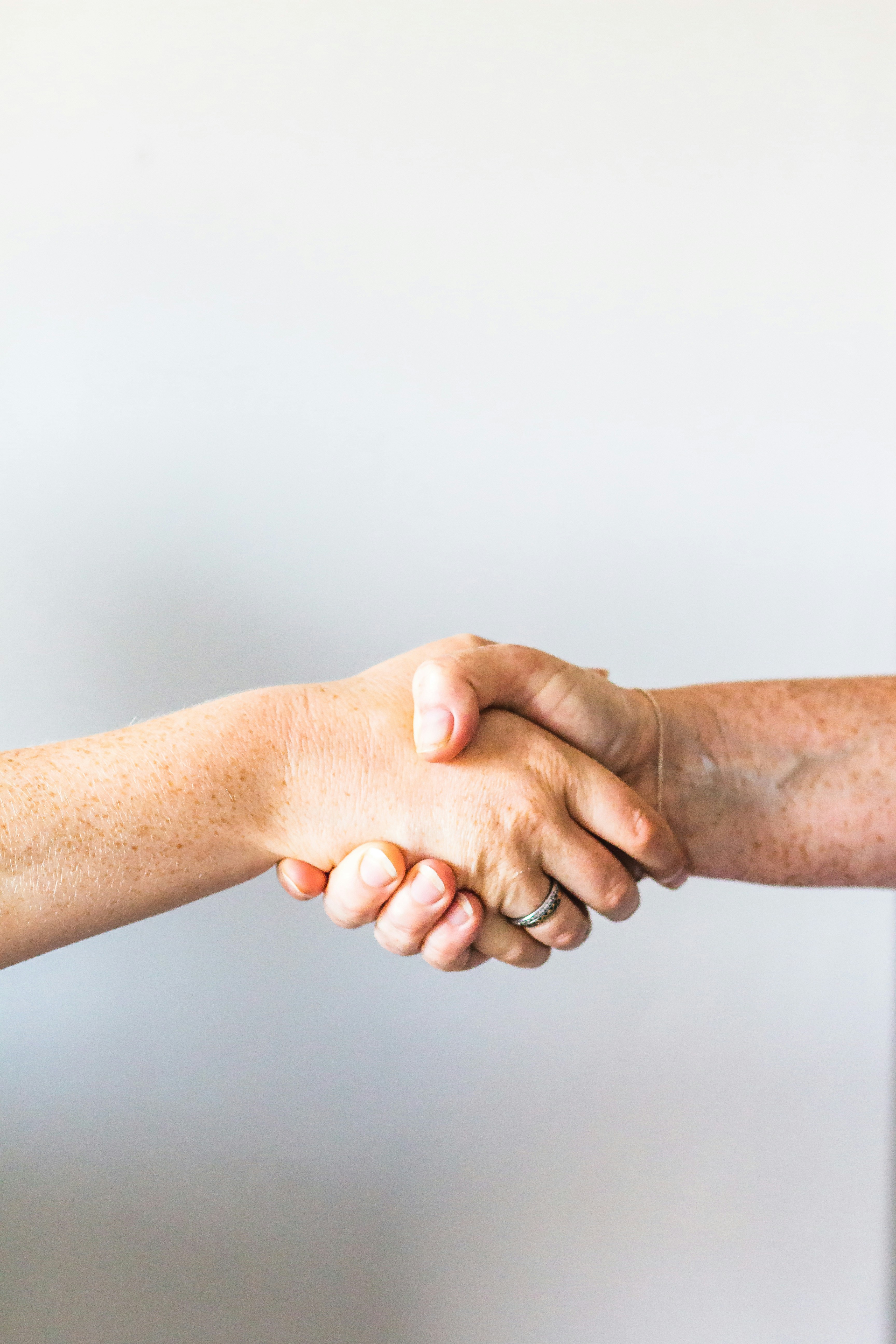 Contractor shaking hands with customer