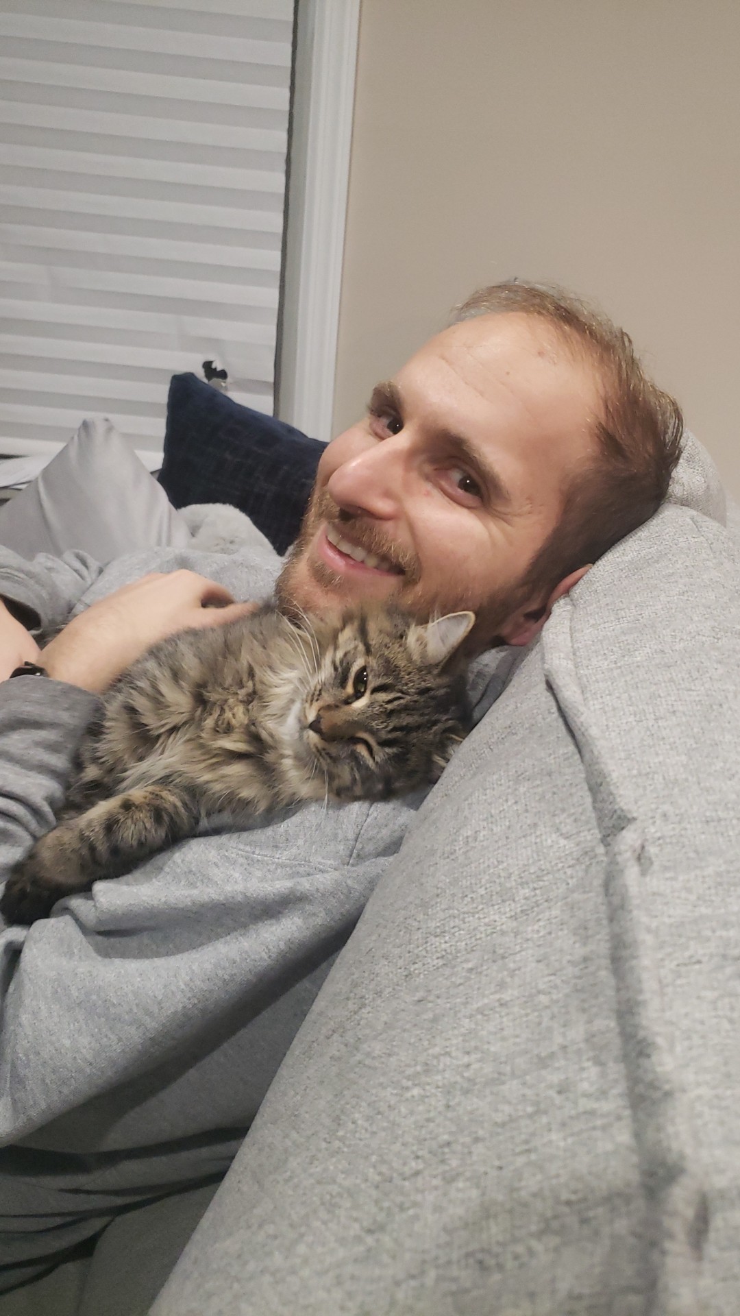 Izik, one of my Mom's former law clerks, chose Love when he and his wife Nicolle adopted kitty Kona!