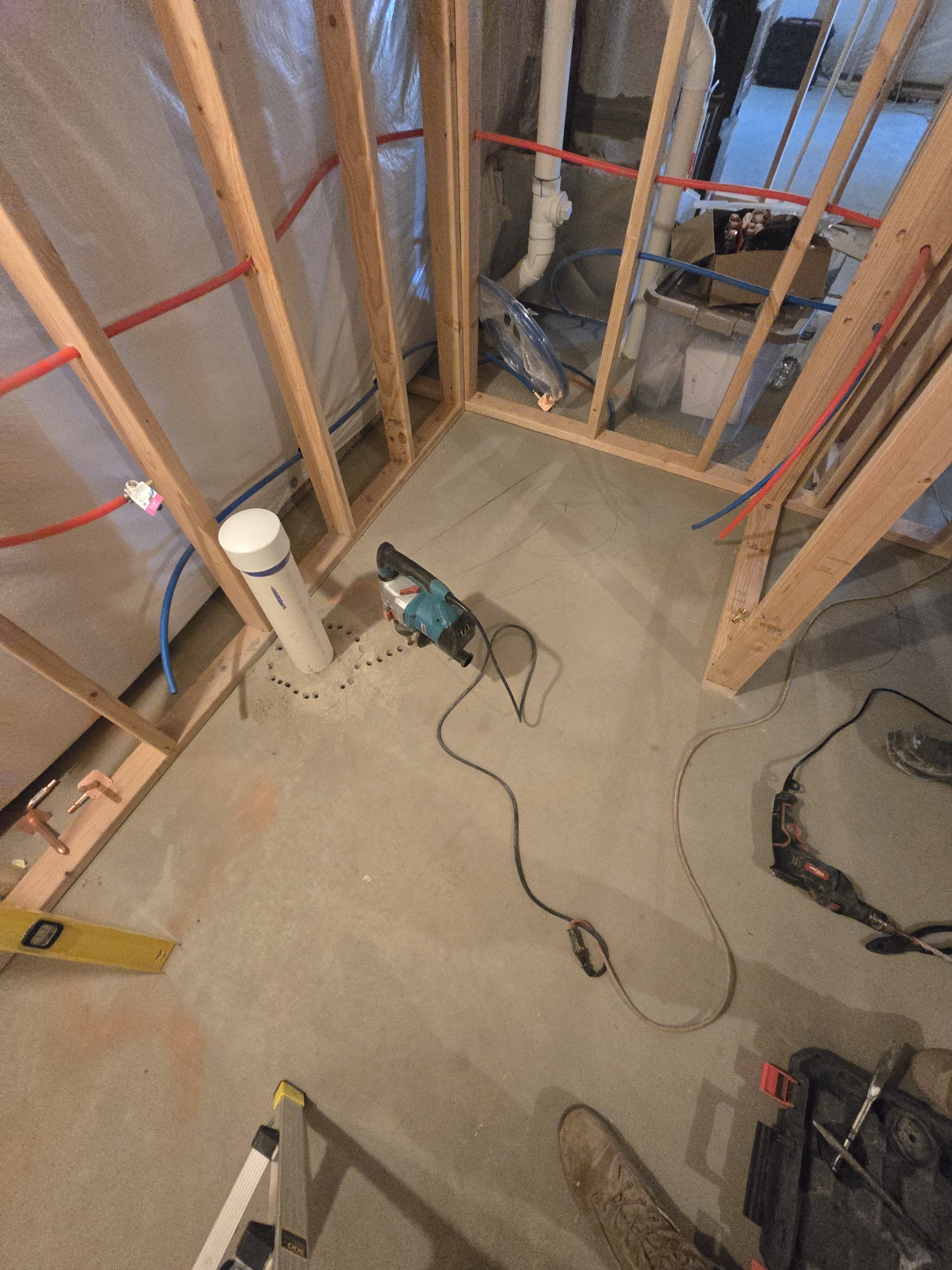 Basement hallway with modern black doors and fresh trim