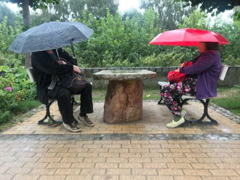 Women with Umbrellas