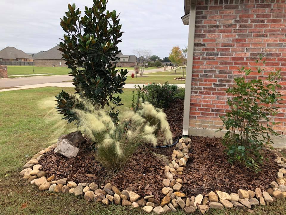 Decorative landscaping with ornamental grasses in Bastrop, LA