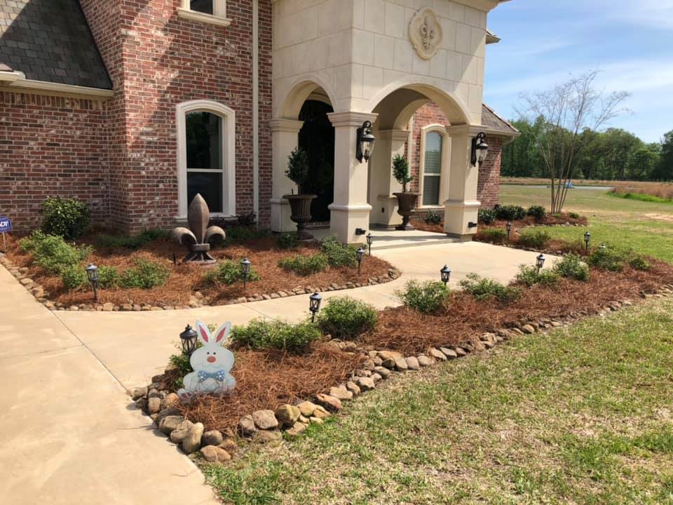 Raised garden bed with seasonal flowers in Rayville, LA
