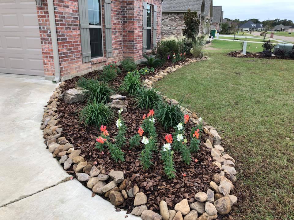 Tiered flower bed with colorful seasonal blooms in West Monroe, Louisiana