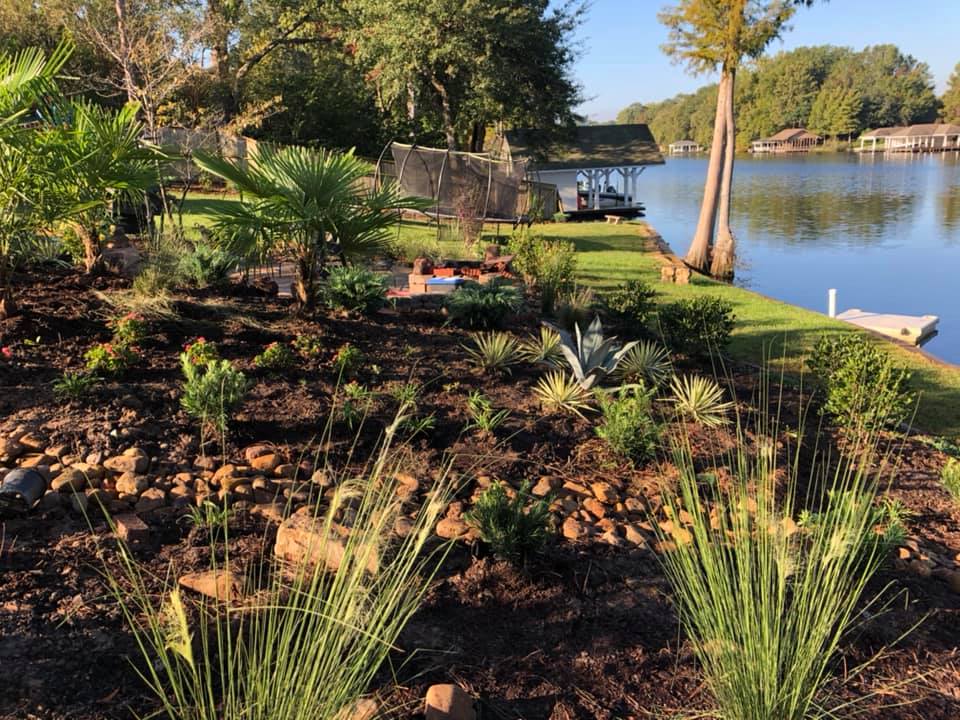 Decorative garden bed with mixed perennials in Ruston, LA