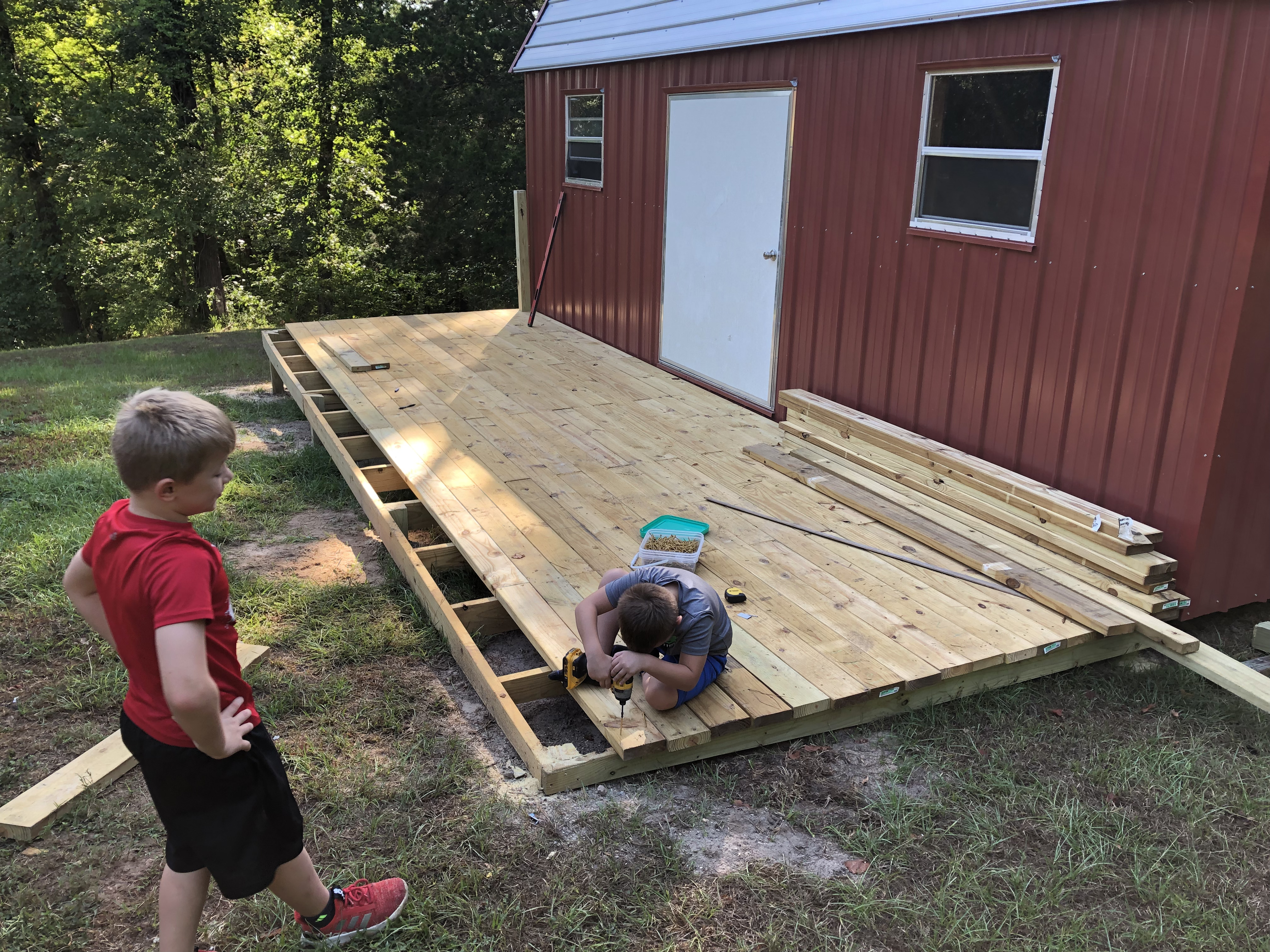 Building a porch for a storage building.