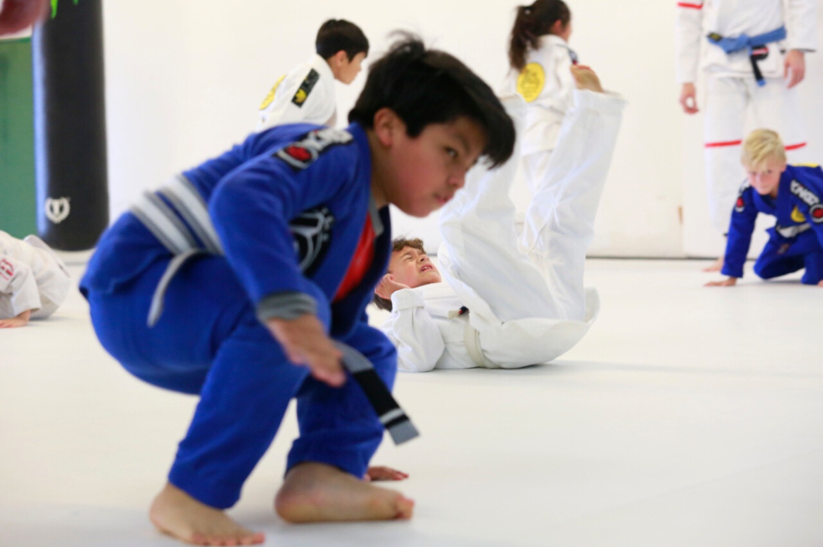 Martial arts instructor with kids