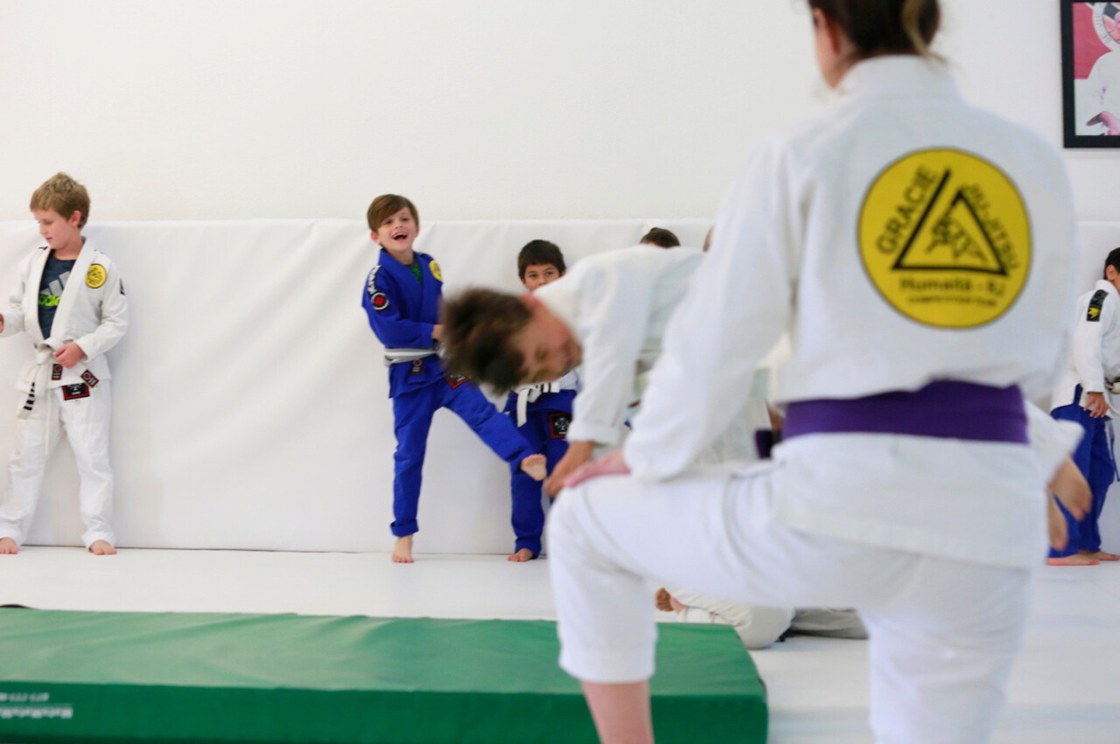Martial arts instructor with kids