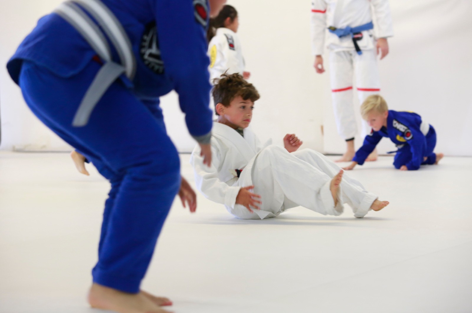 Martial arts instructor with kids