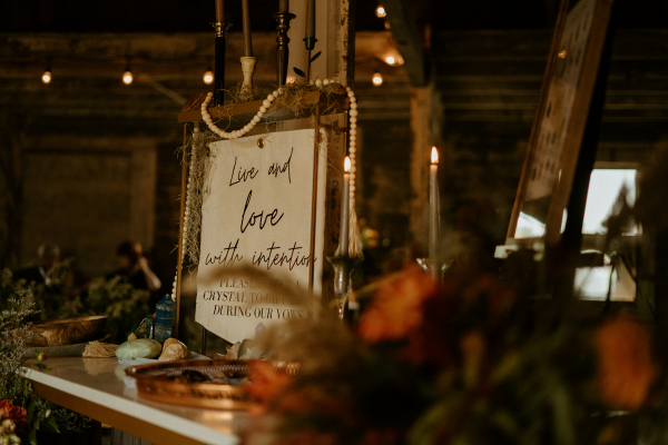 Table with Sign that says Live and Love with Intention