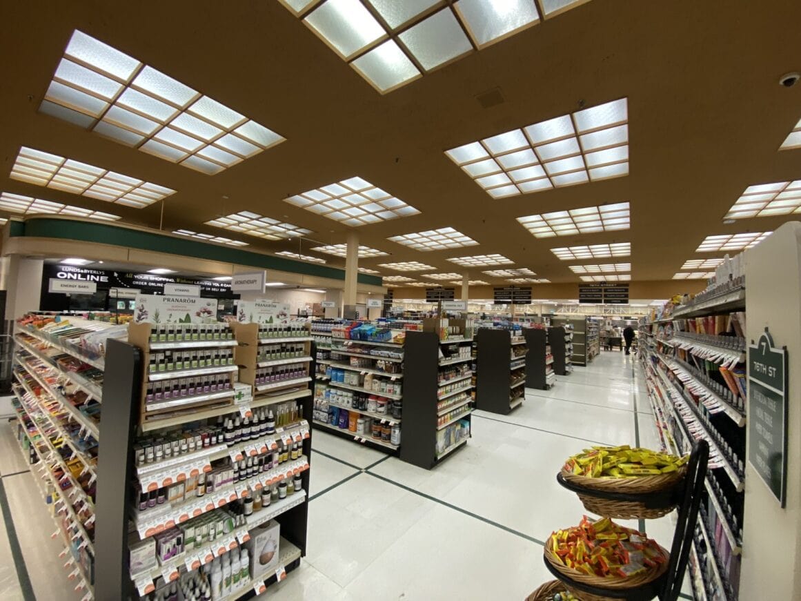 a store with shelves of food with average lighting