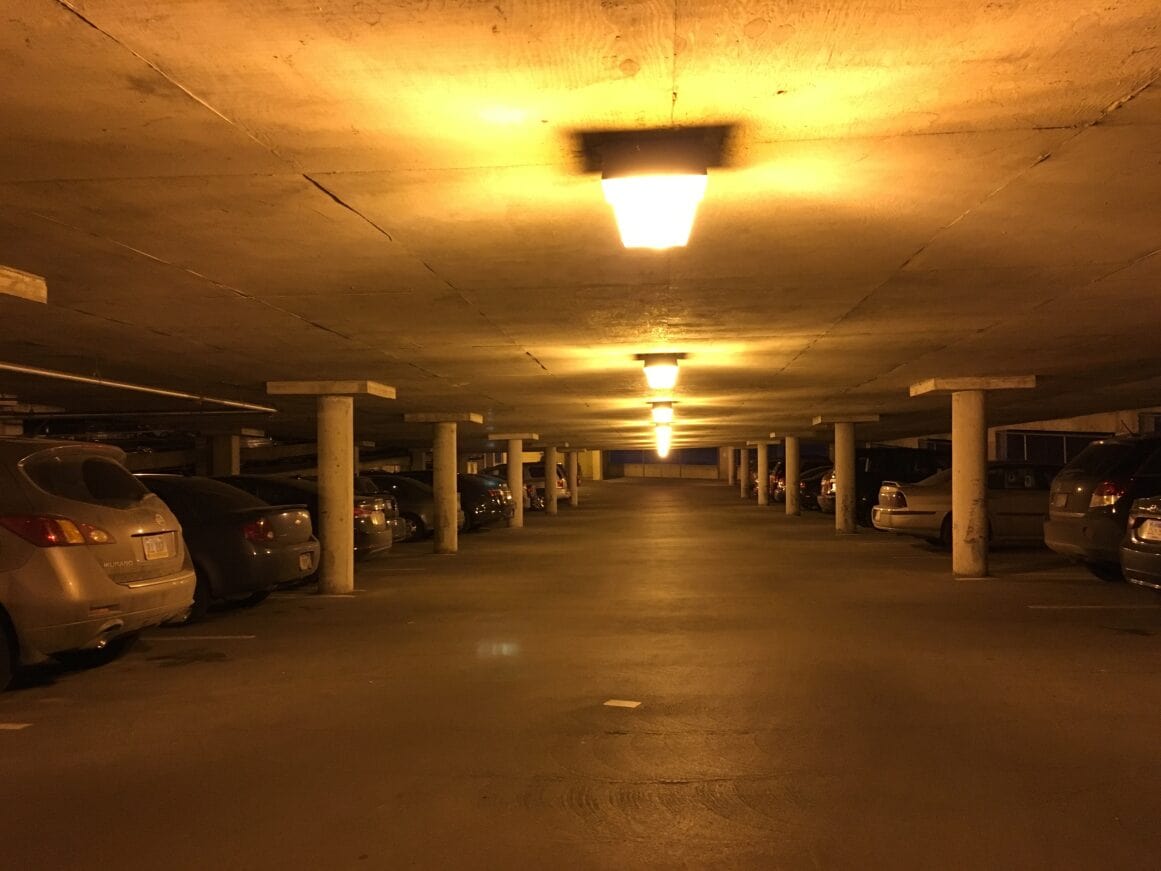 a parking garage with lights