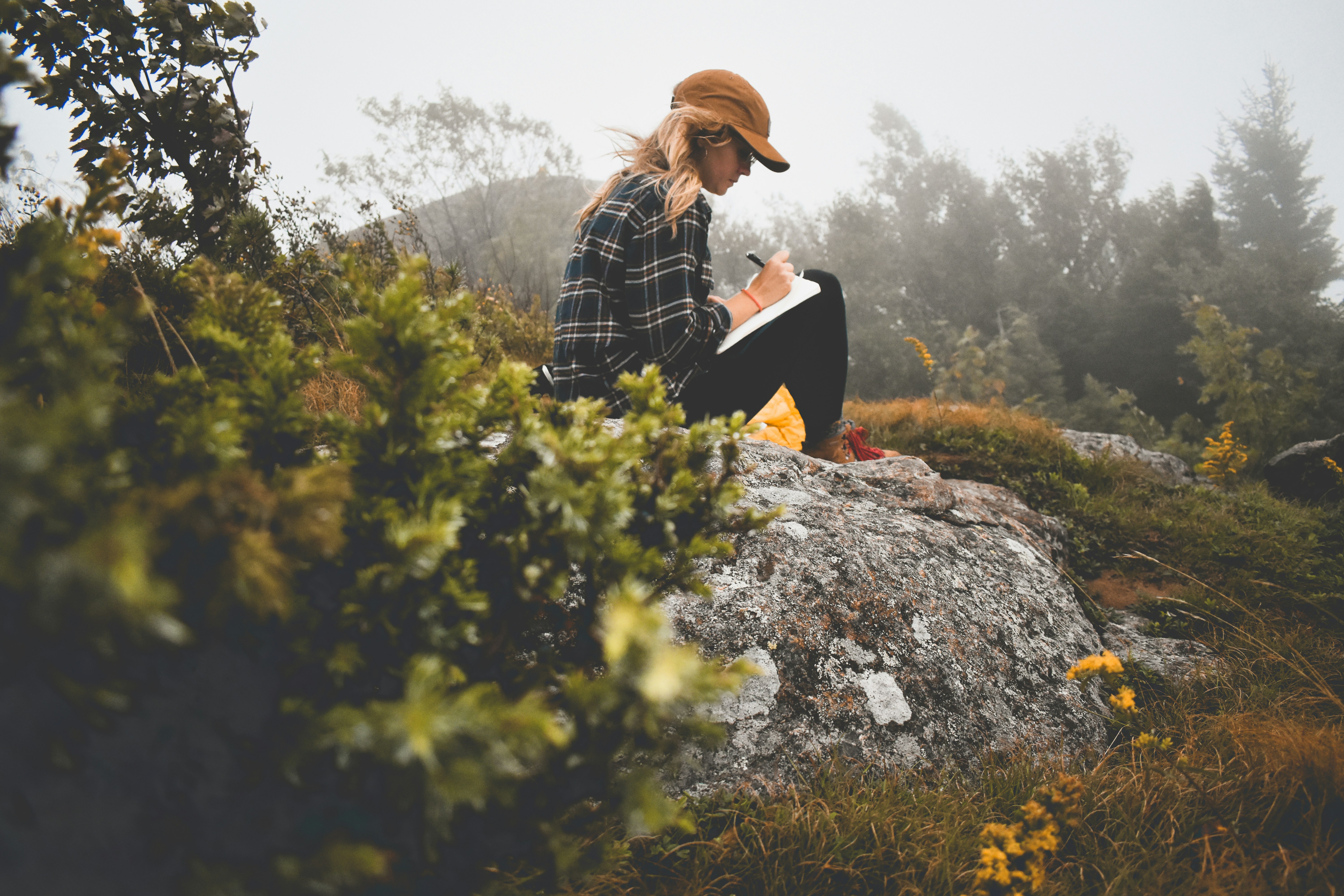 Autumn light and a calm journaling moment, signaling a gentle seasonal reset