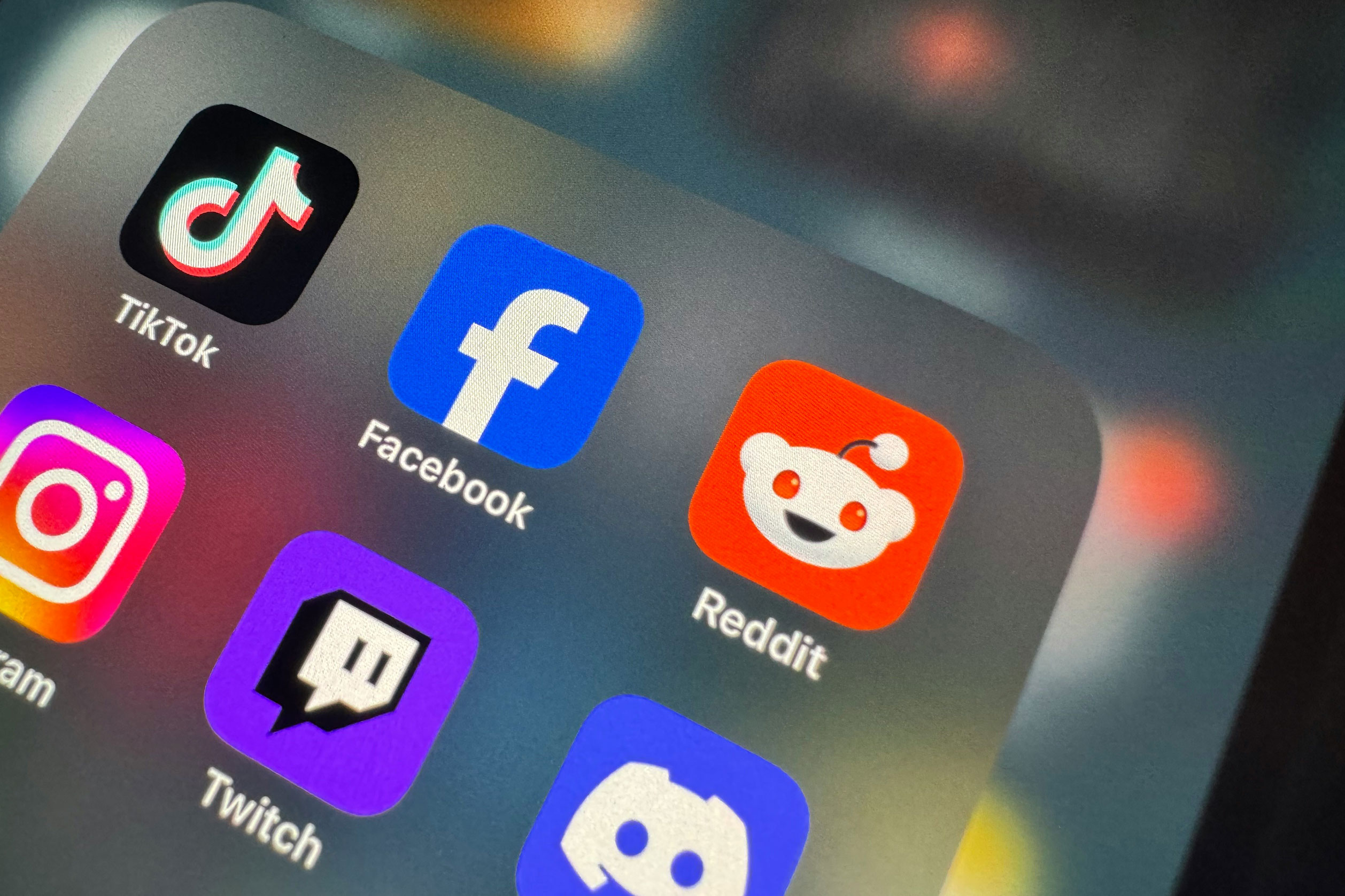 Social media app icons on a smartphone Social media app icons on a smartphone