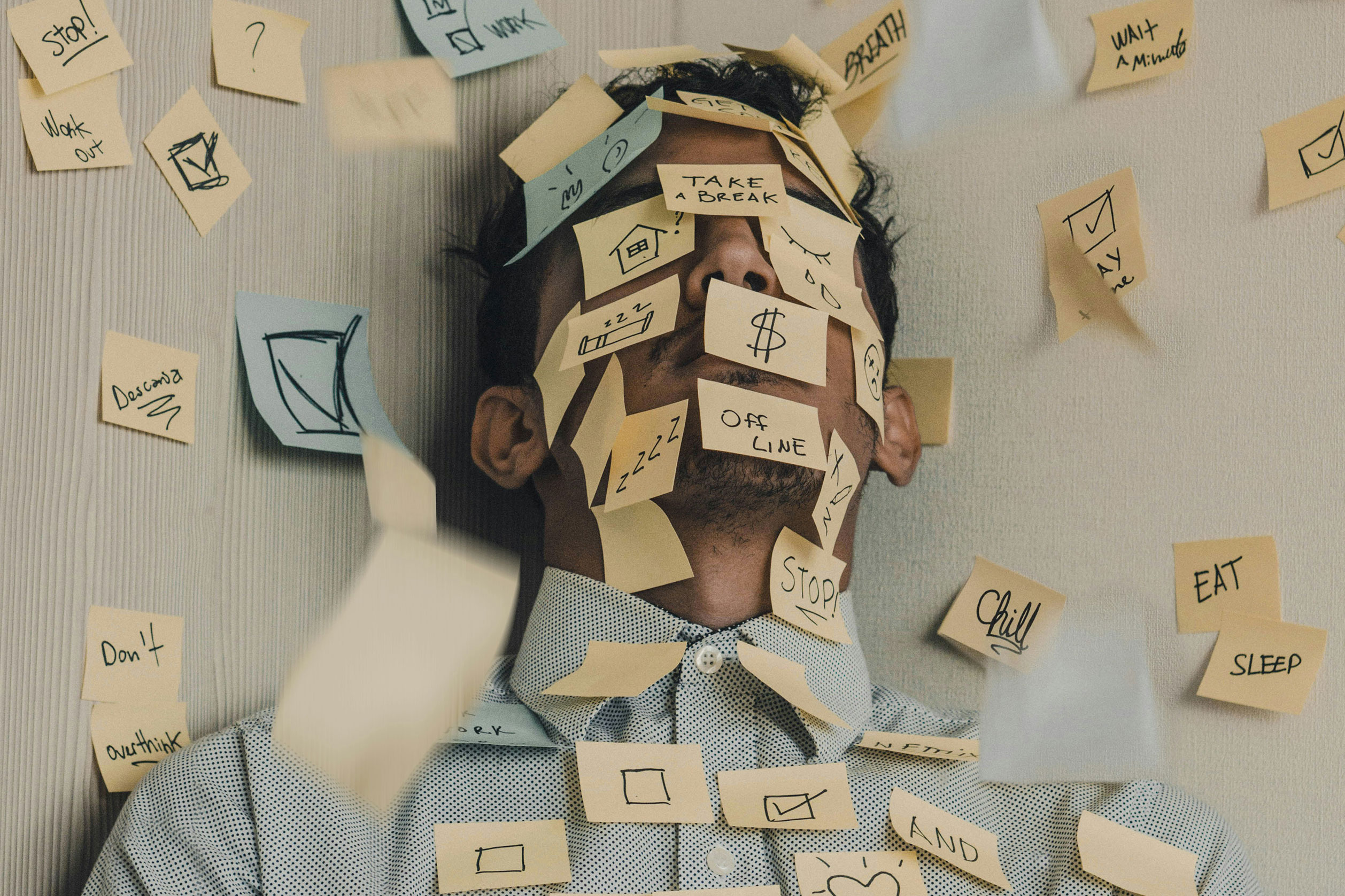 Overwhelmed and burned out male marketer Overwhelmed and burned out male marketer