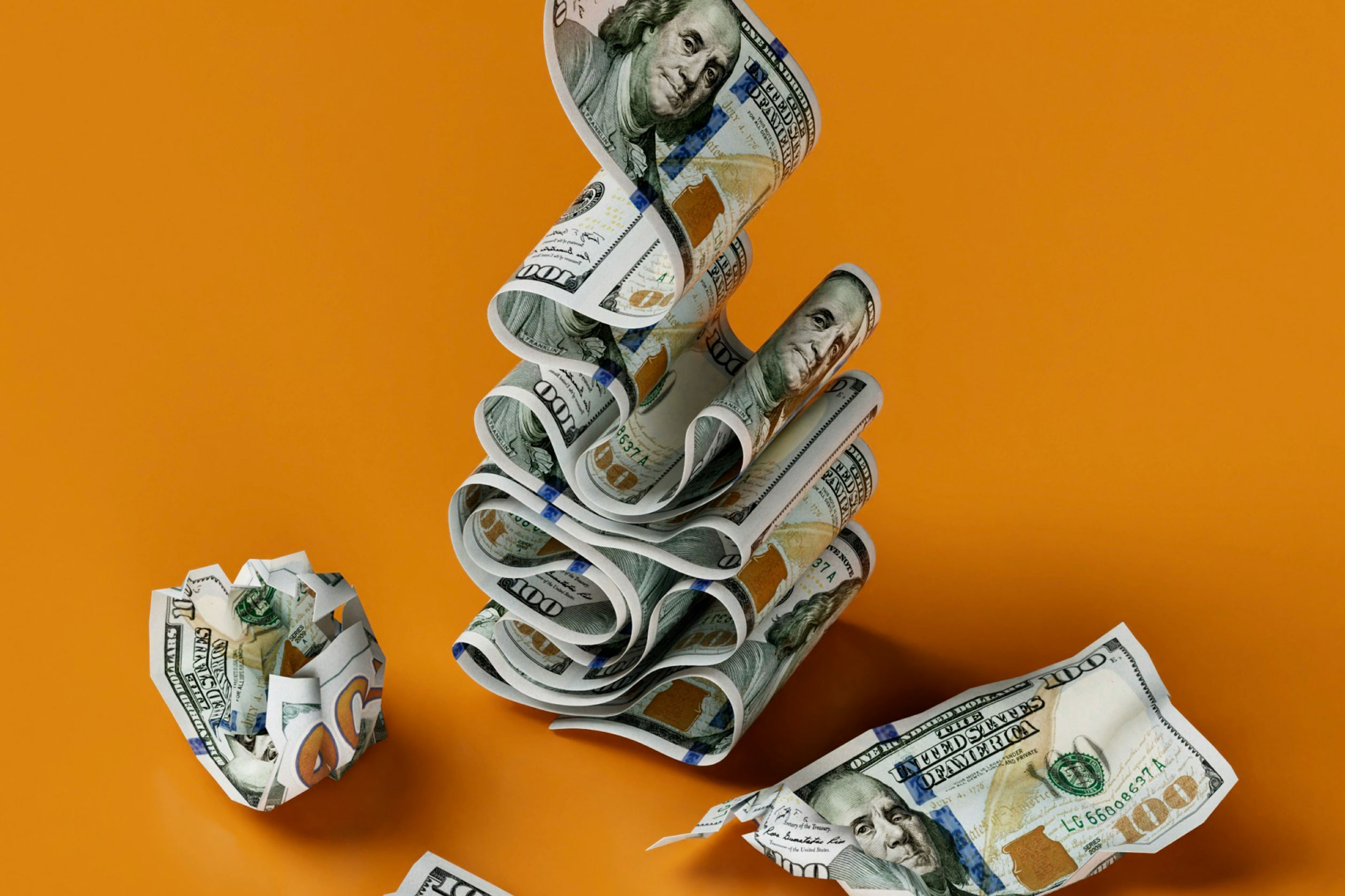 Recurring revenue (image of dollars dropping onto an orange surface)