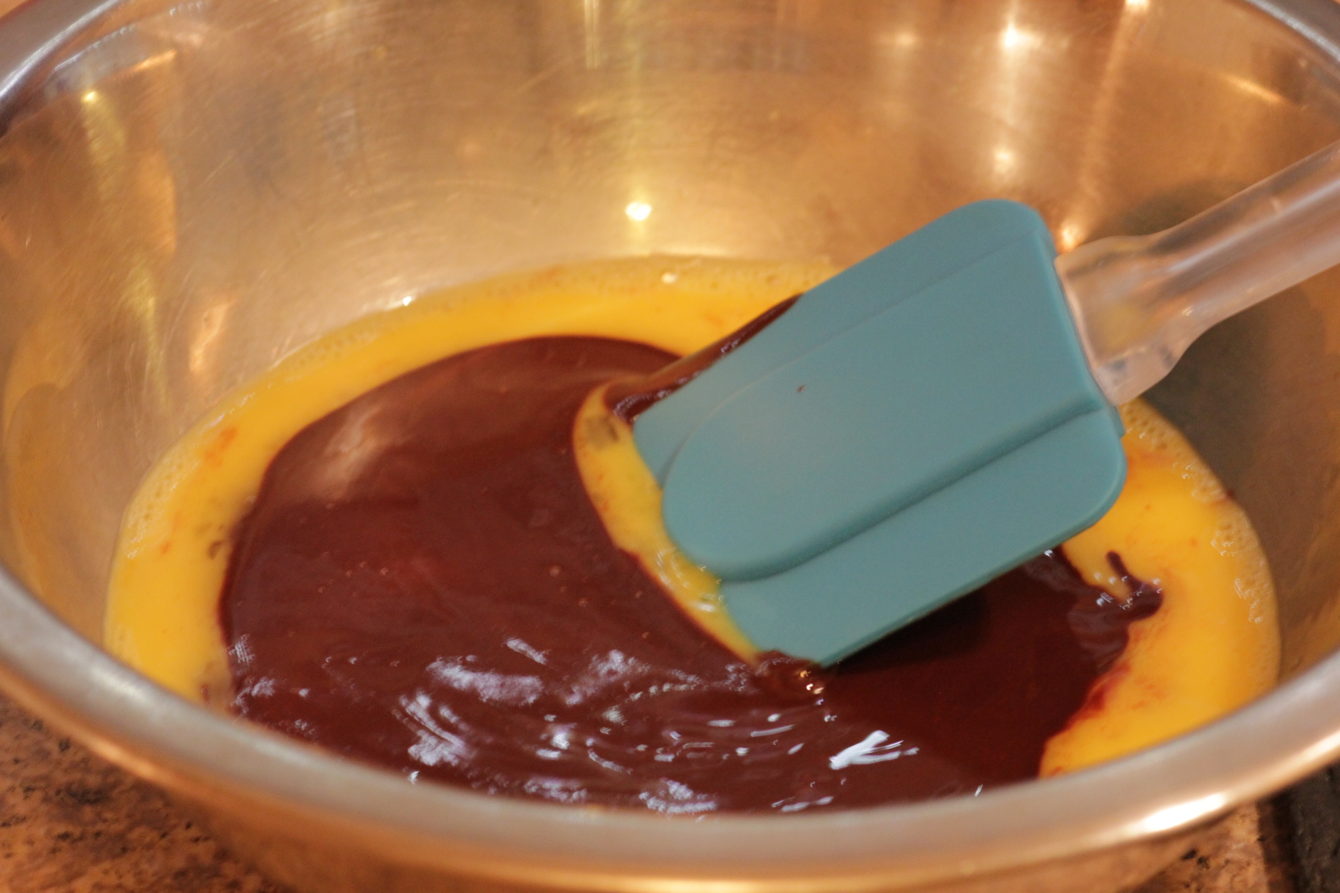 Whisking eggs and chocolate Whisking eggs and chocolate