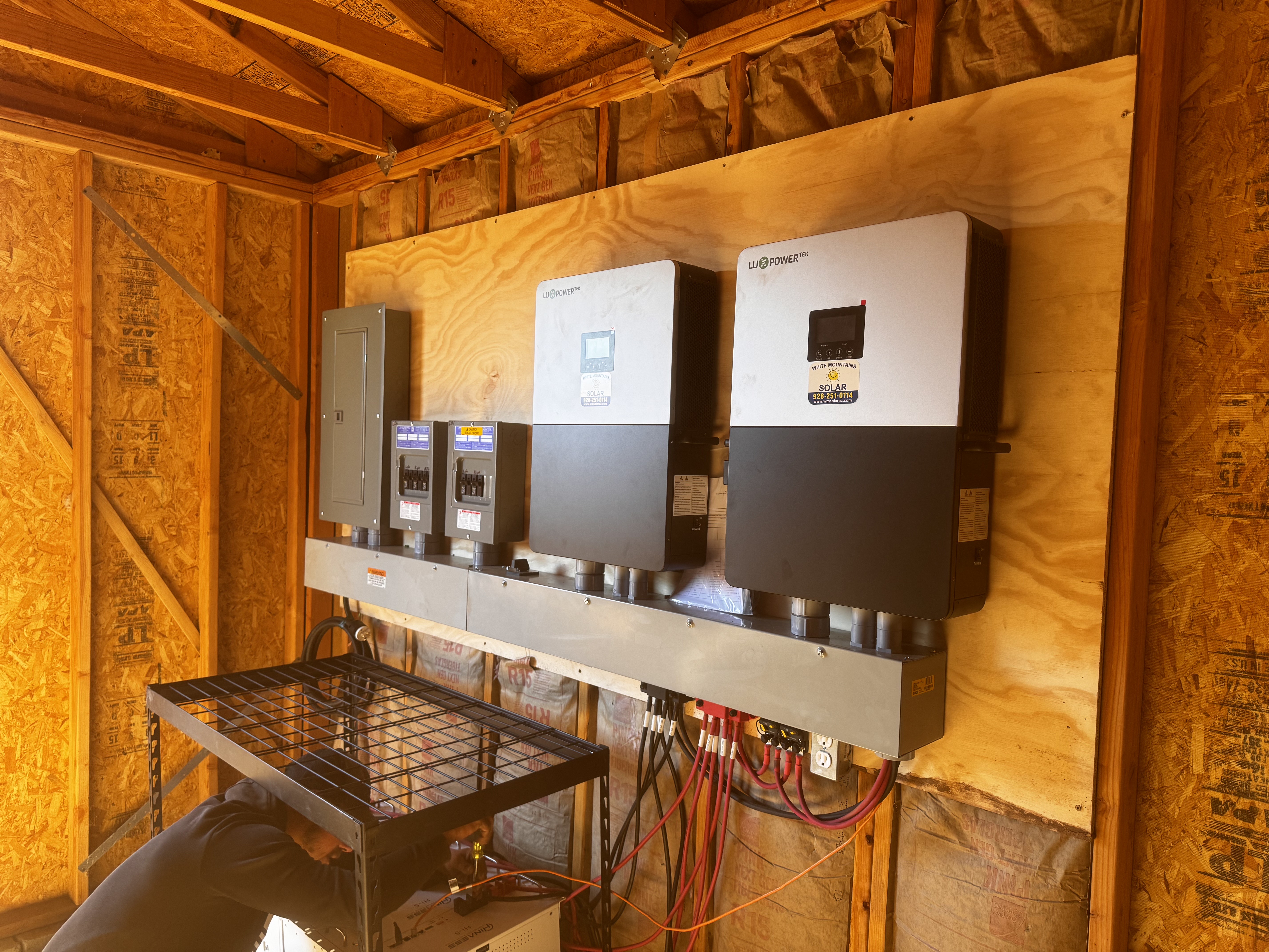 White Mountains Solar team working on an installation