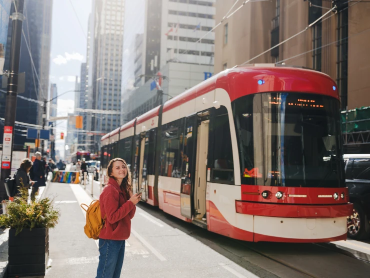 Woman waiting for the tram in Toronto