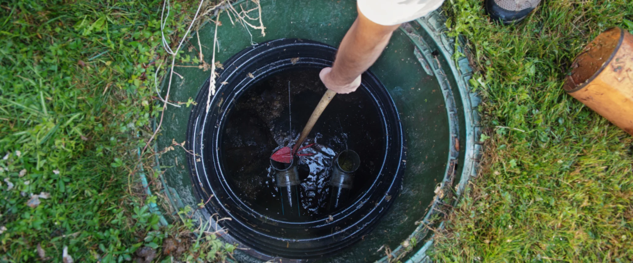 Inside view of septic tank being cleaned and inspected Inside view of septic tank being cleaned and inspected