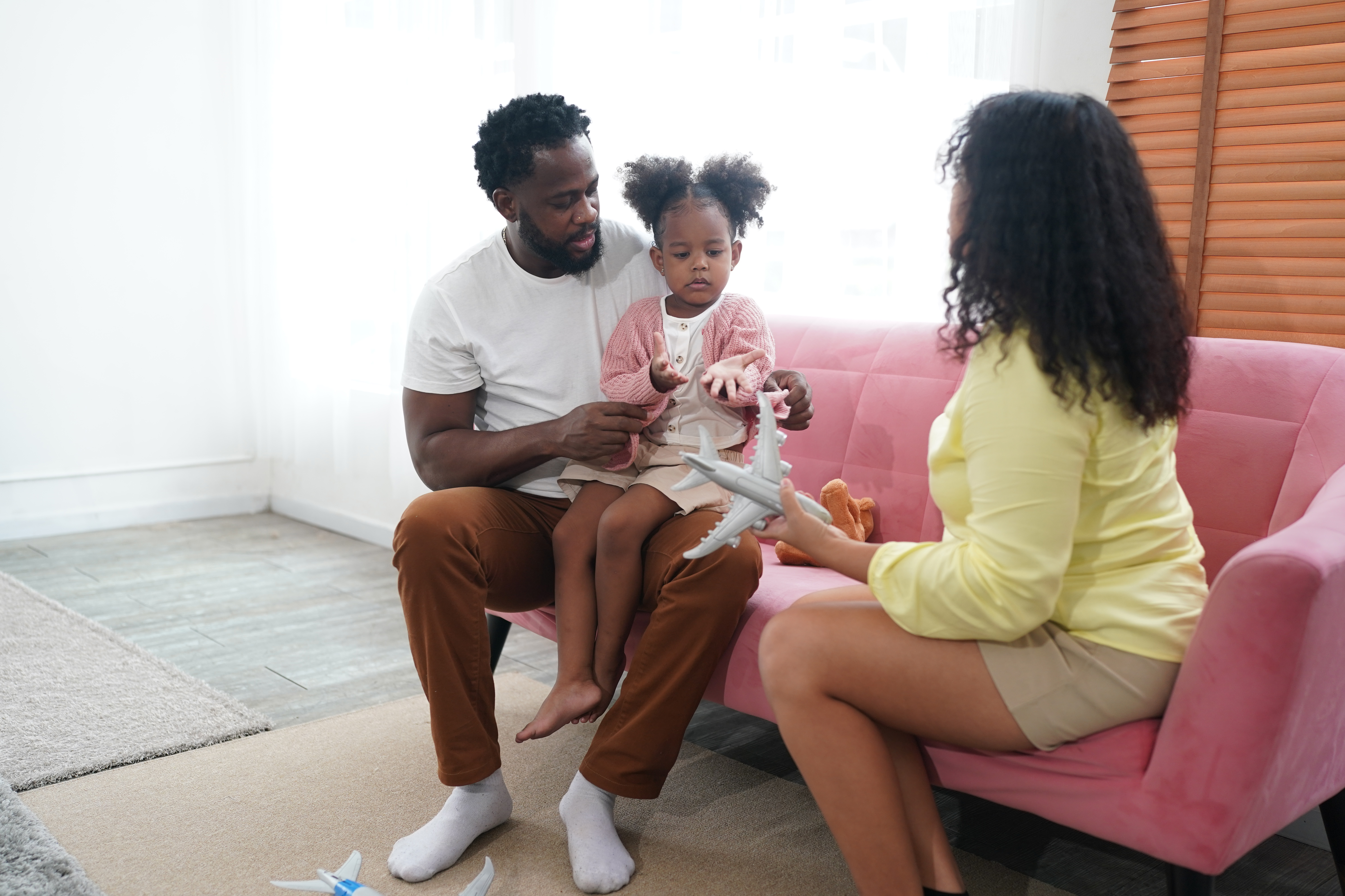 The parents communicate with  their daughter to validate her feelings.