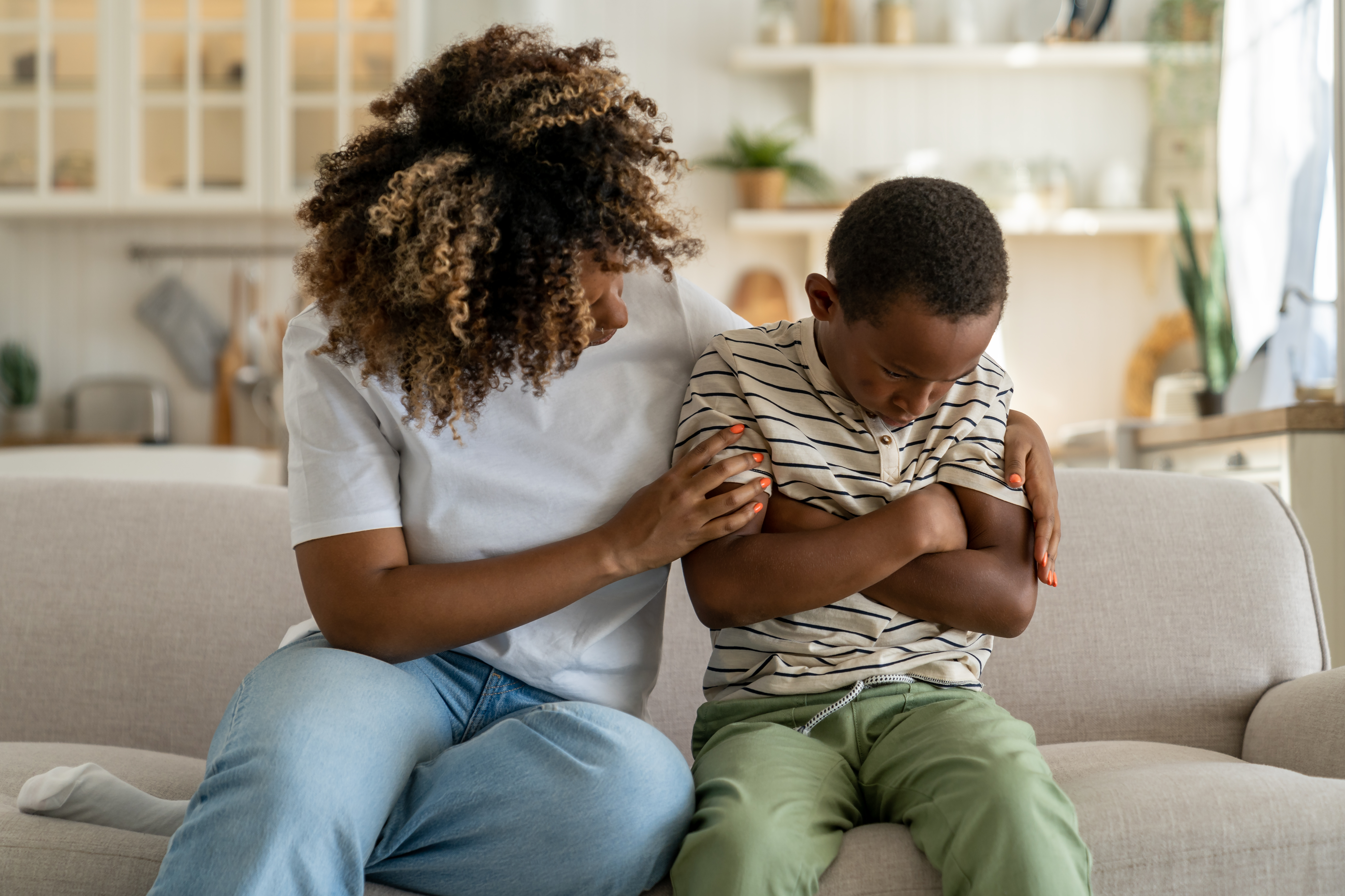 A mother sits with him, offering comfort to help him feel secure and calm down faster.