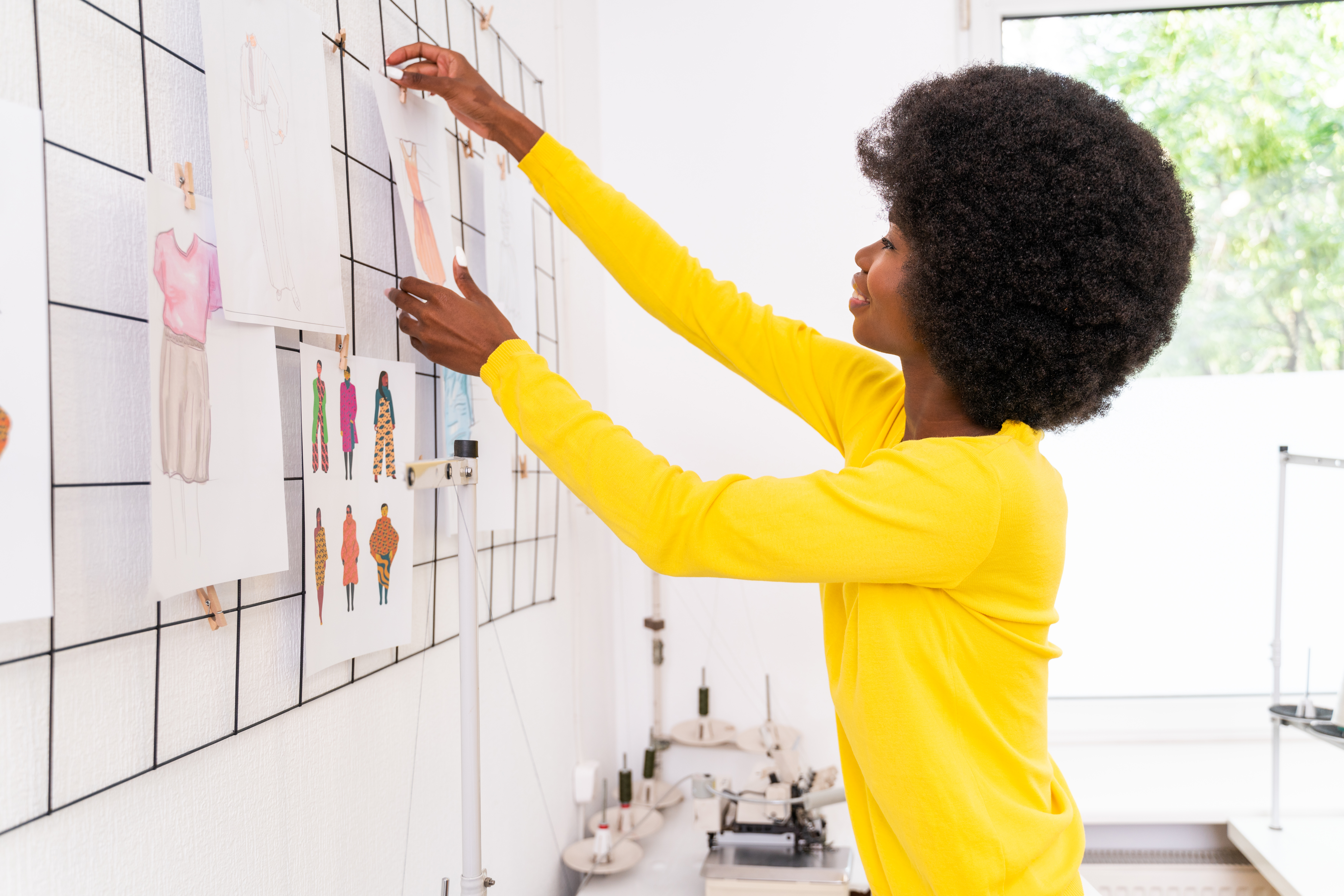 The mother makes a basic visual chart for the child to follow when getting dressed. The mother makes a basic visual chart for the child to follow when getting dressed.