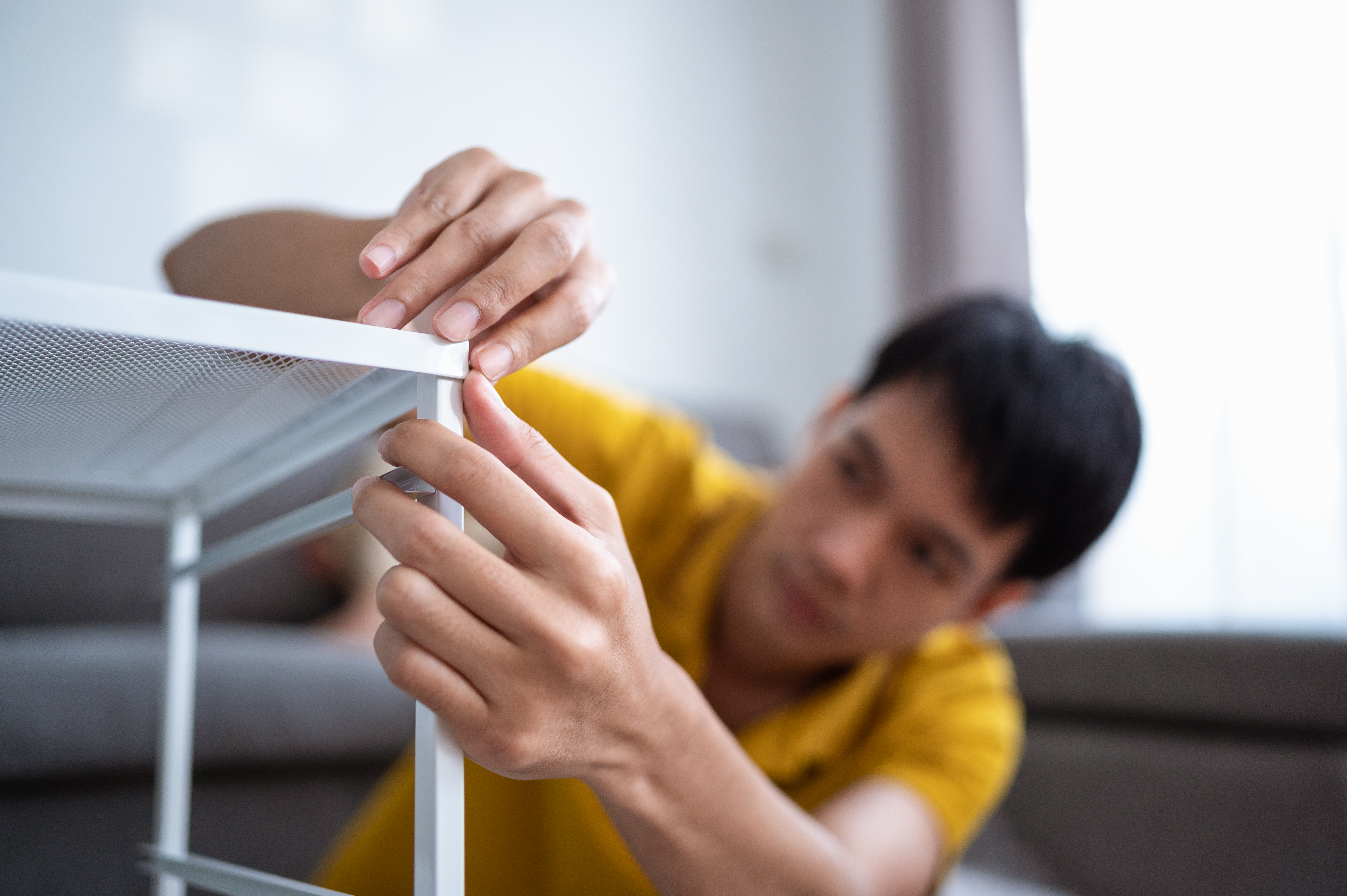 The father installed corner protectors on the table to reduce the risk of injury from accidental bumps and falls. The father installed corner protectors on the table to reduce the risk of injury from accidental bumps and falls.