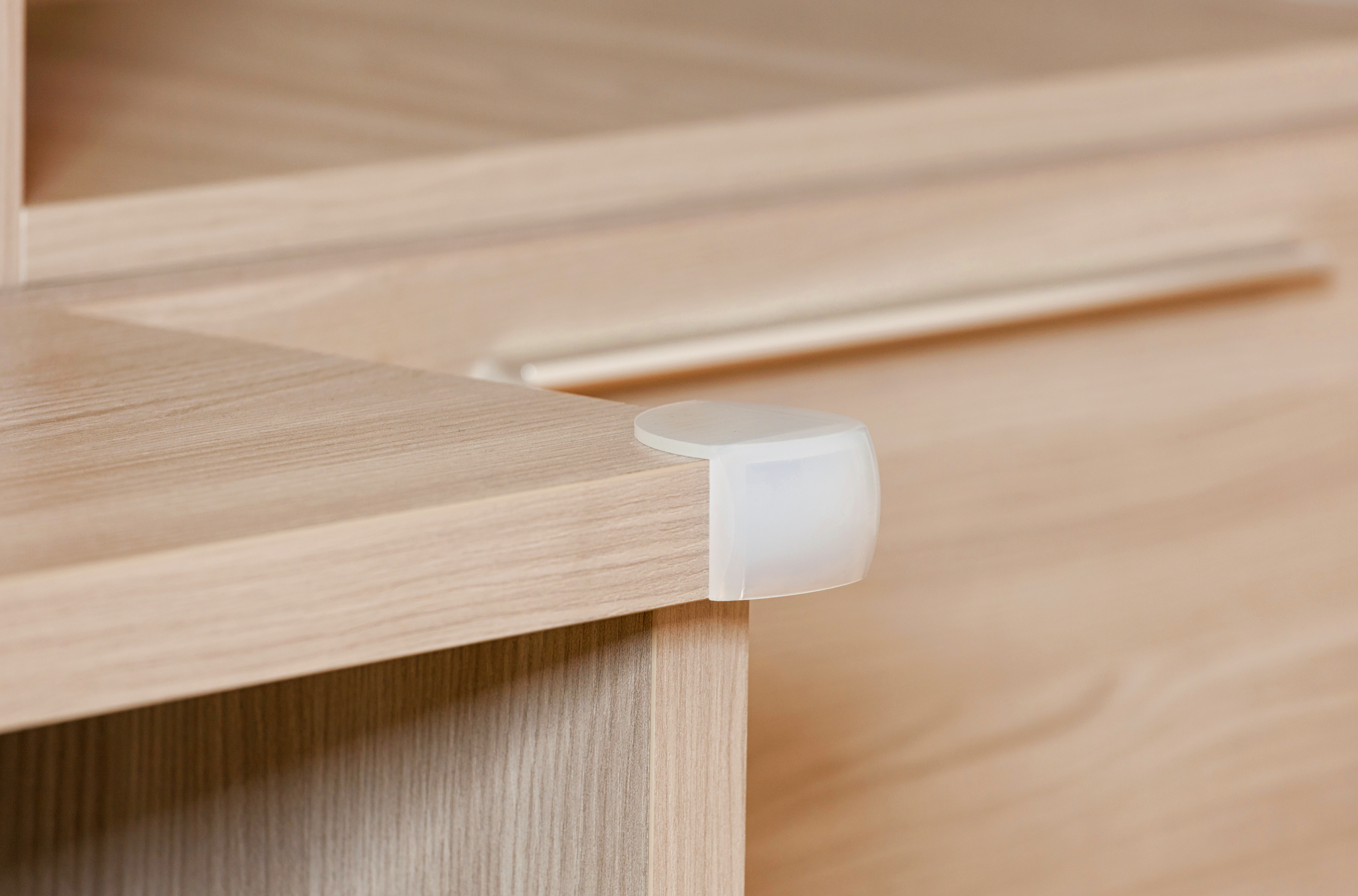 Corner protectors on the table. Corner protectors on the table.