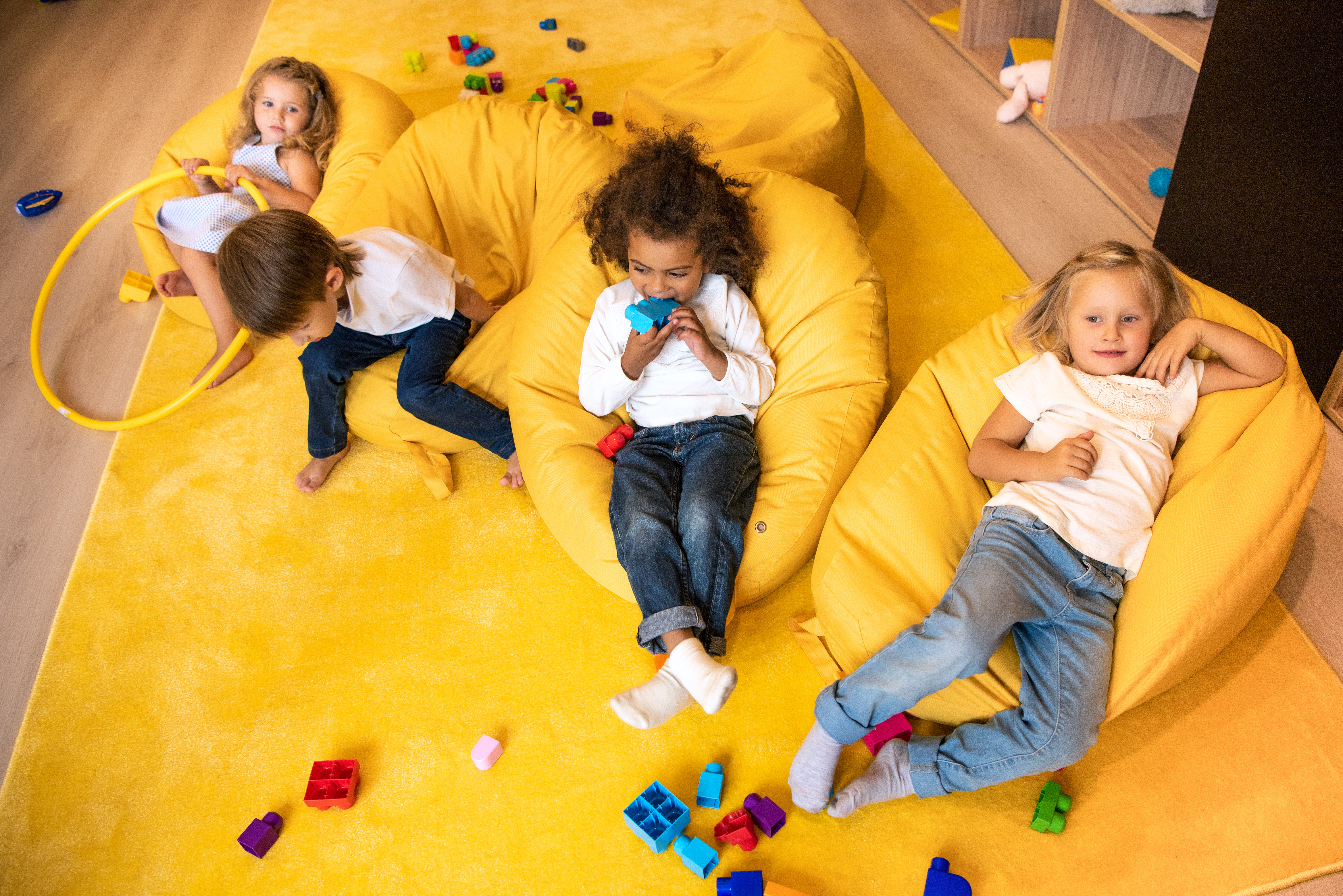 The children comfortably learn and play in their own home. The children comfortably learn and play in their own home.