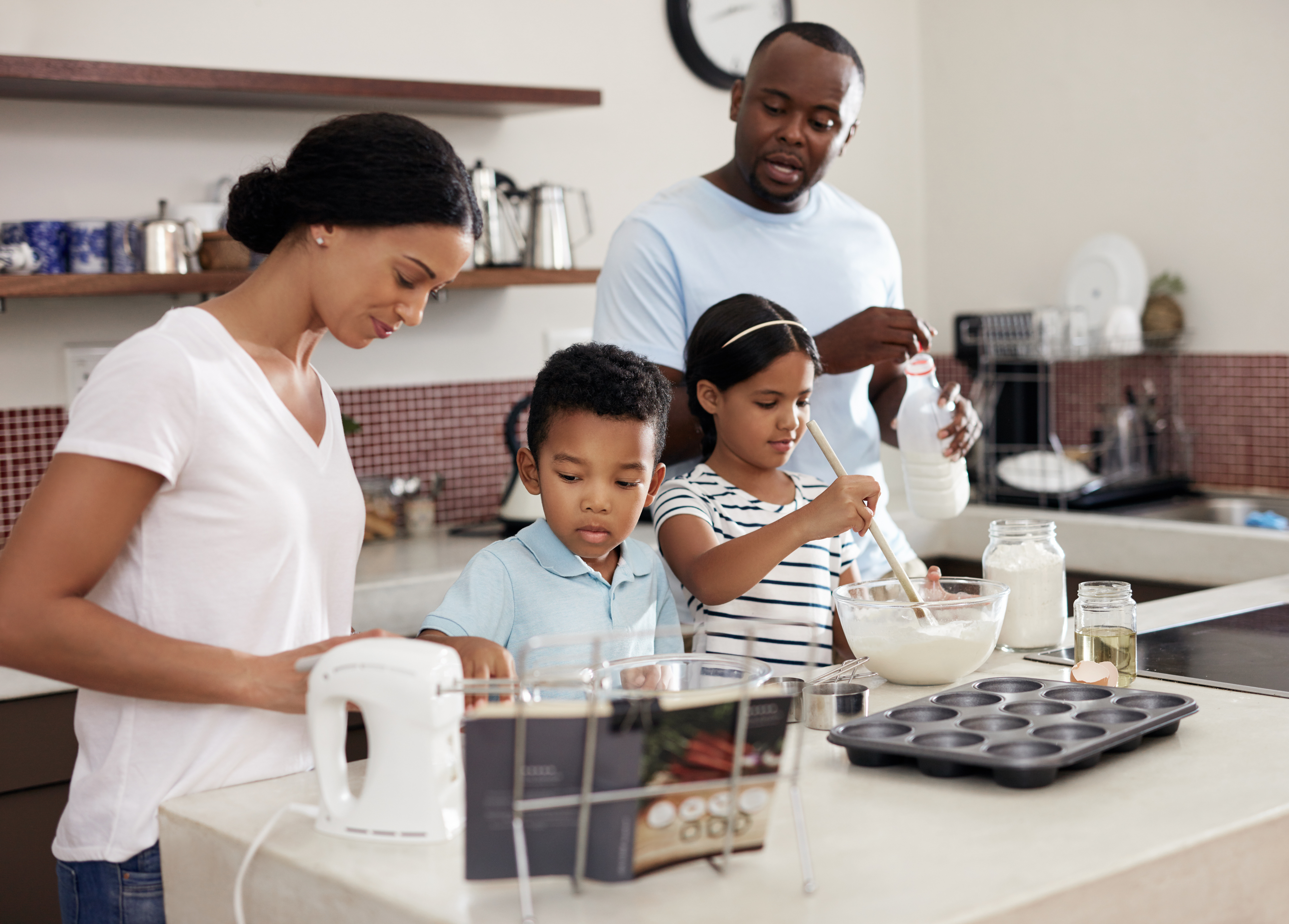 Family preparing meal together Family preparing meal together