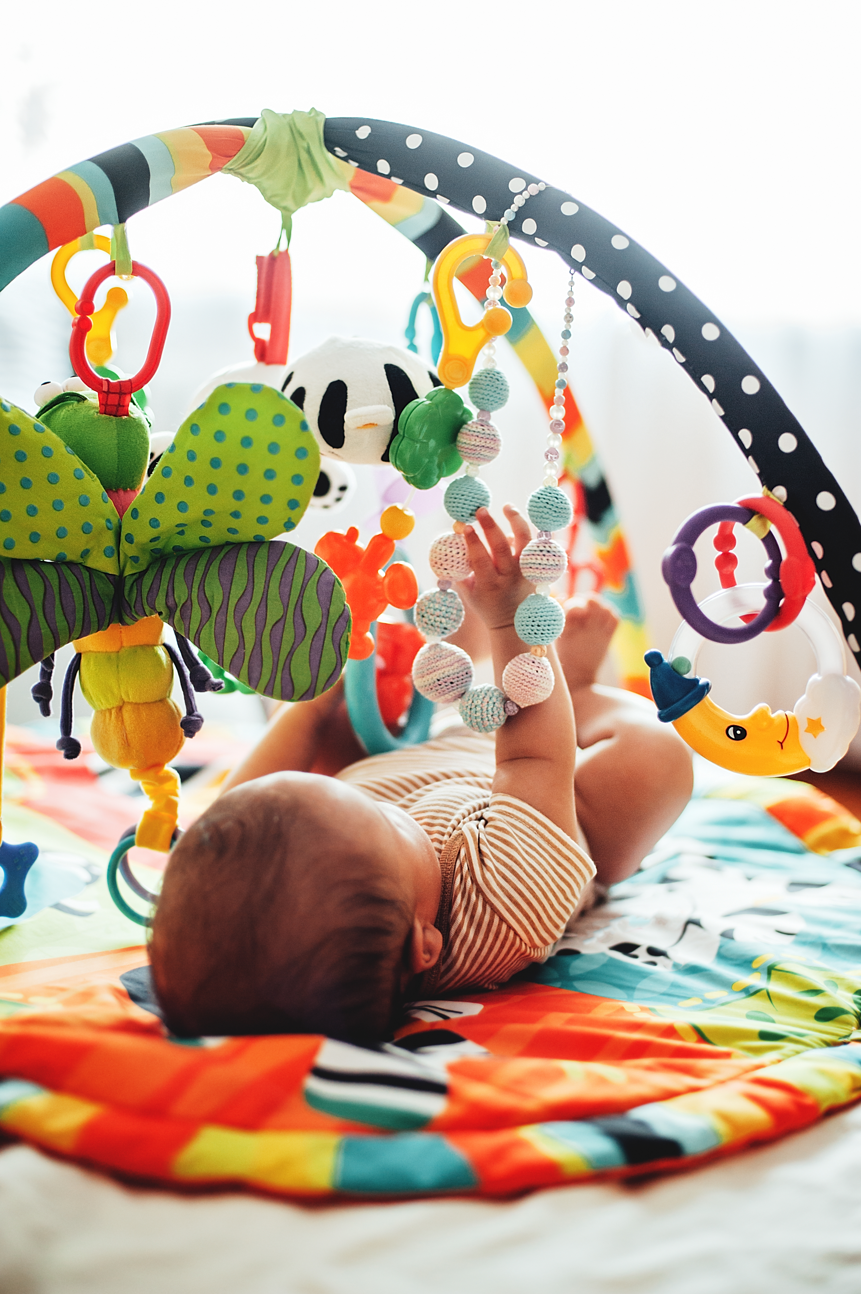 Baby playing mobile toy