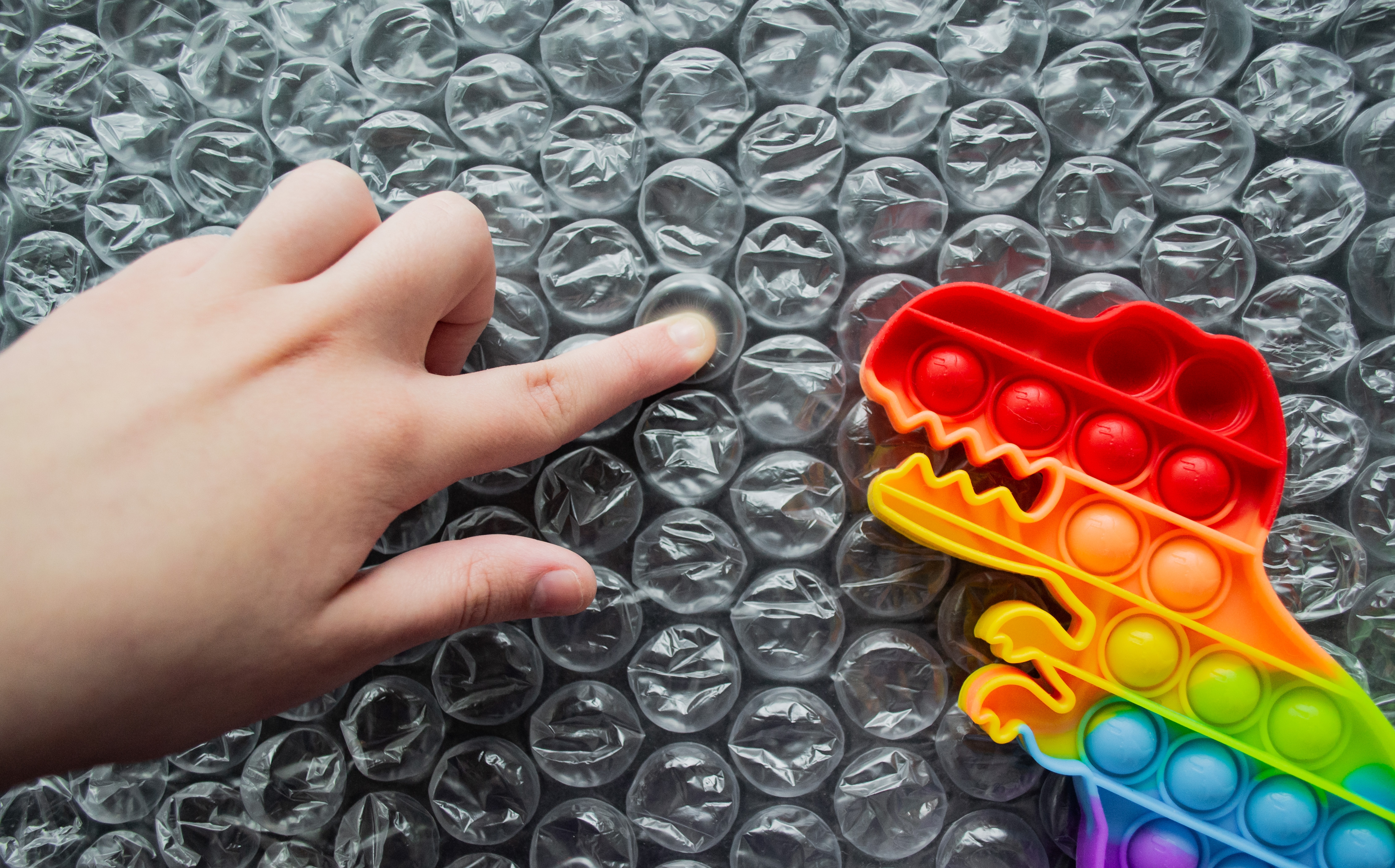 Bubble wrap and a Dino pop it